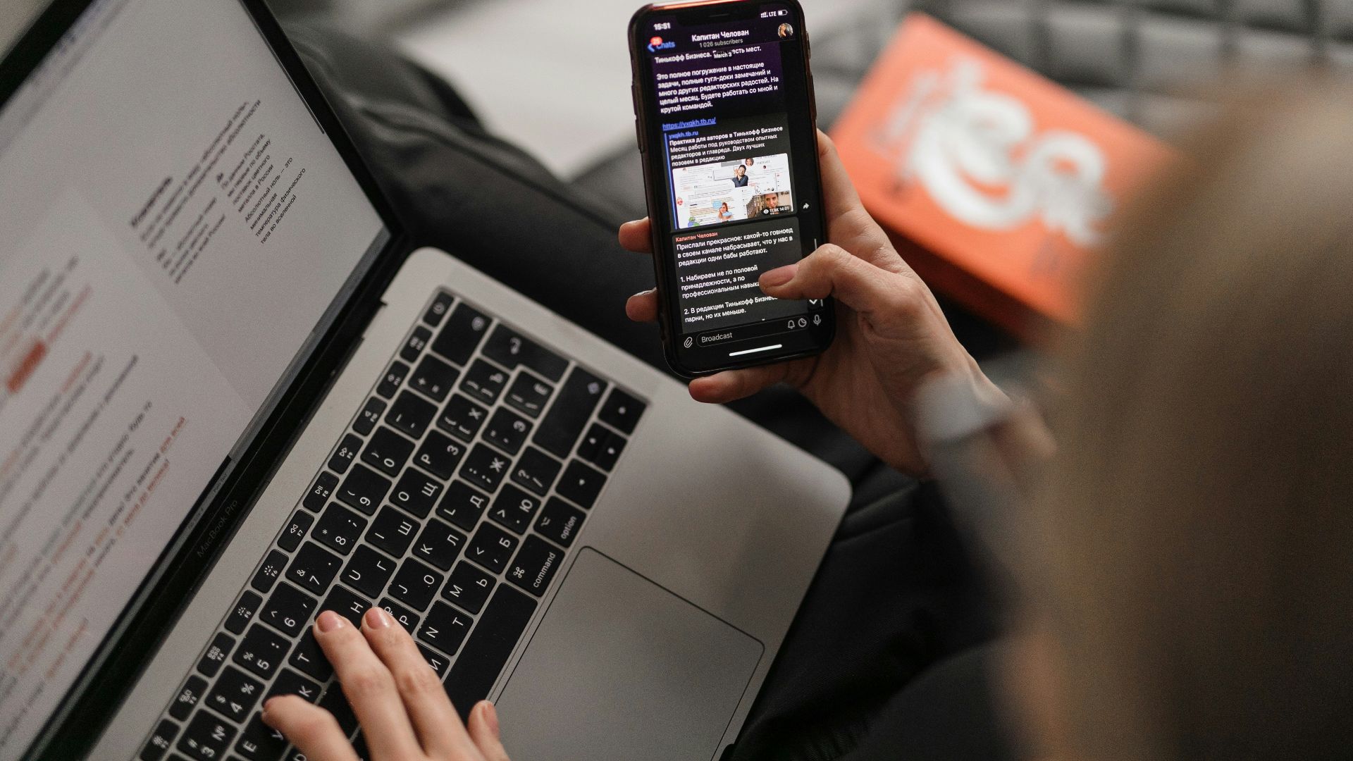 person holding black iphone 4