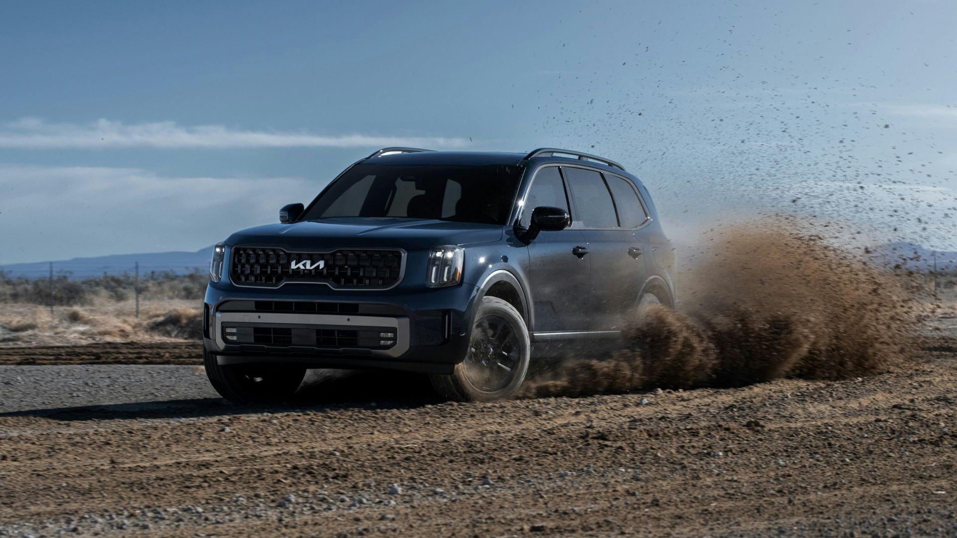 a car driving on a dirt road
