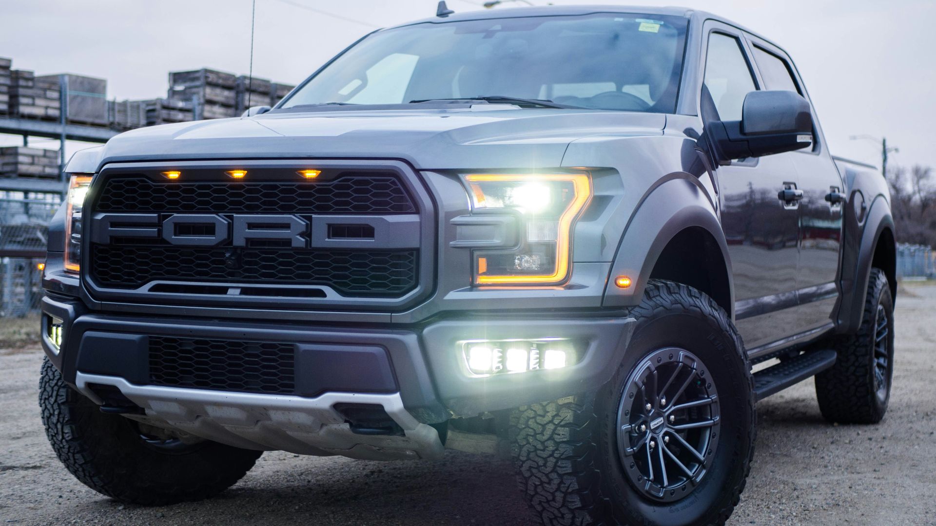 black chevrolet crew cab pickup truck on road during daytime