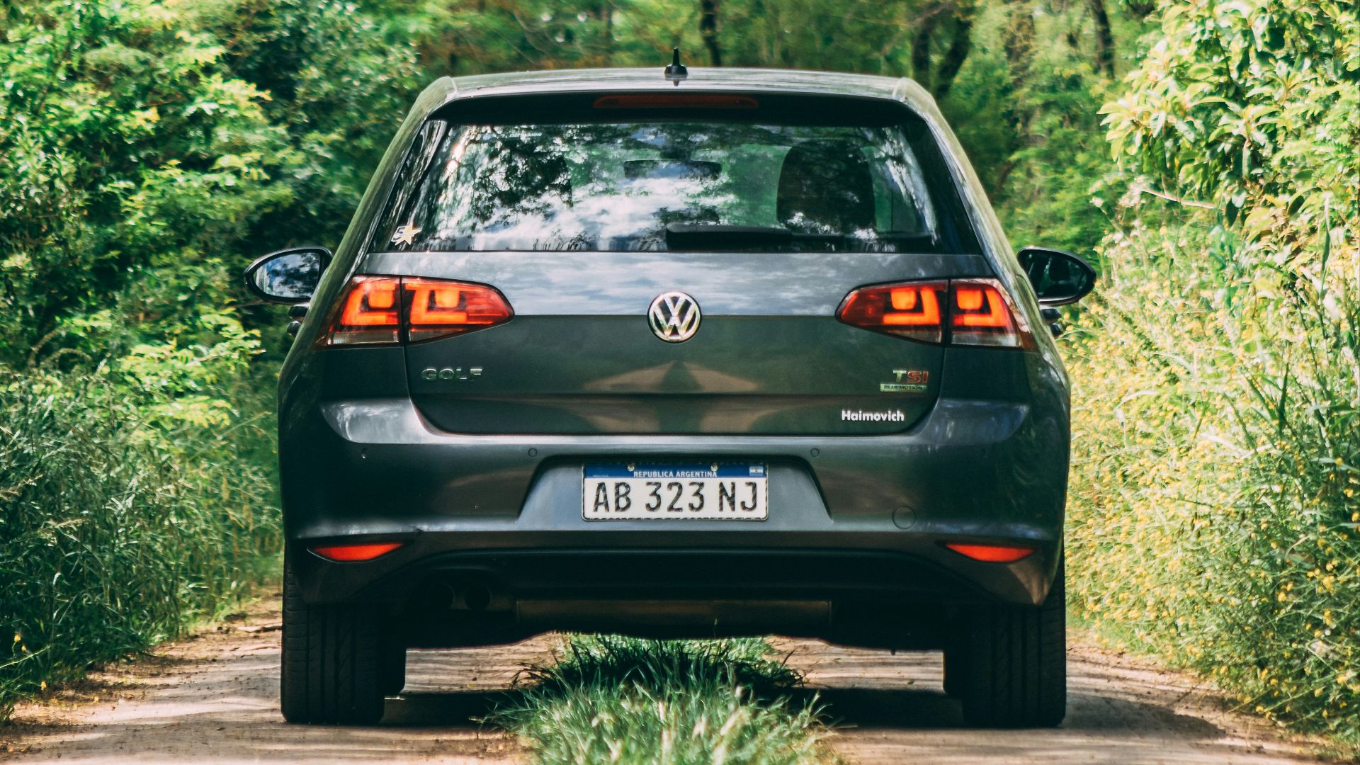 a car is parked on the side of the road