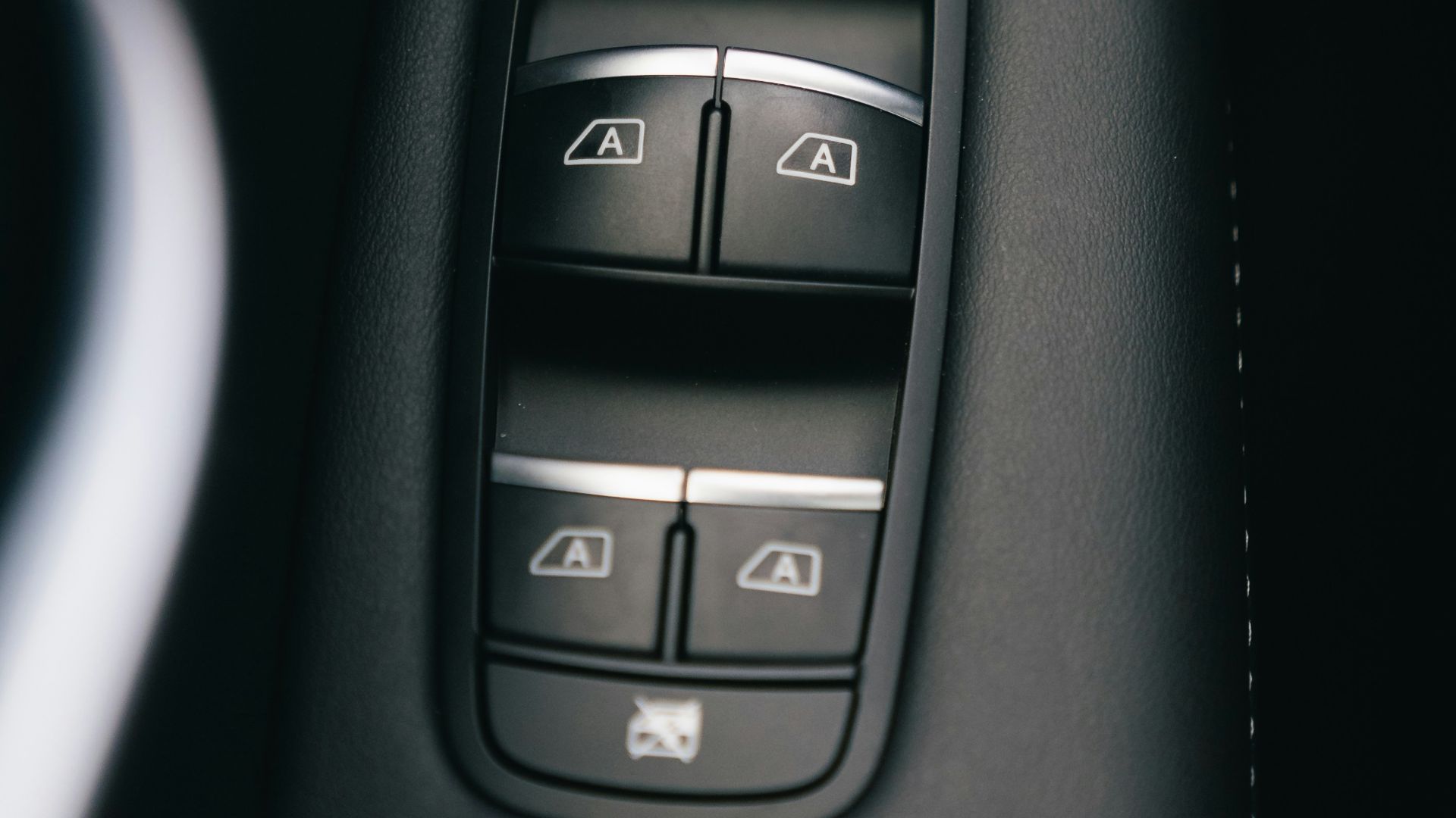 Car door panel with window and lock controls