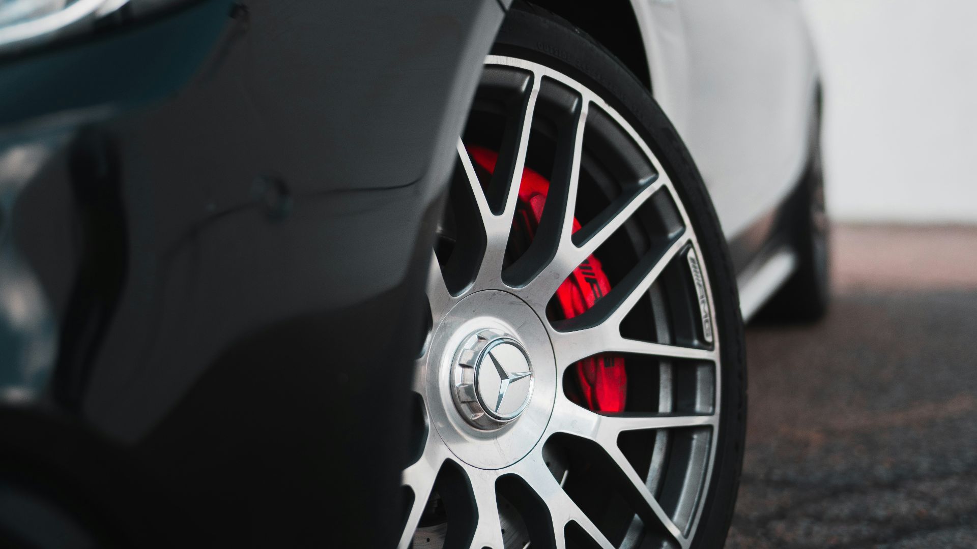 black car with chrome wheel