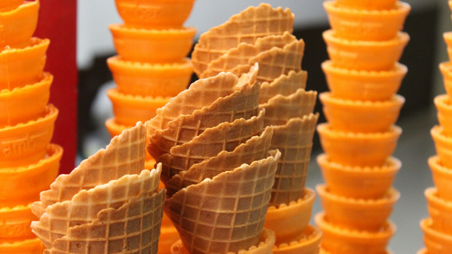 several cones of ice cream stacked on top of each other