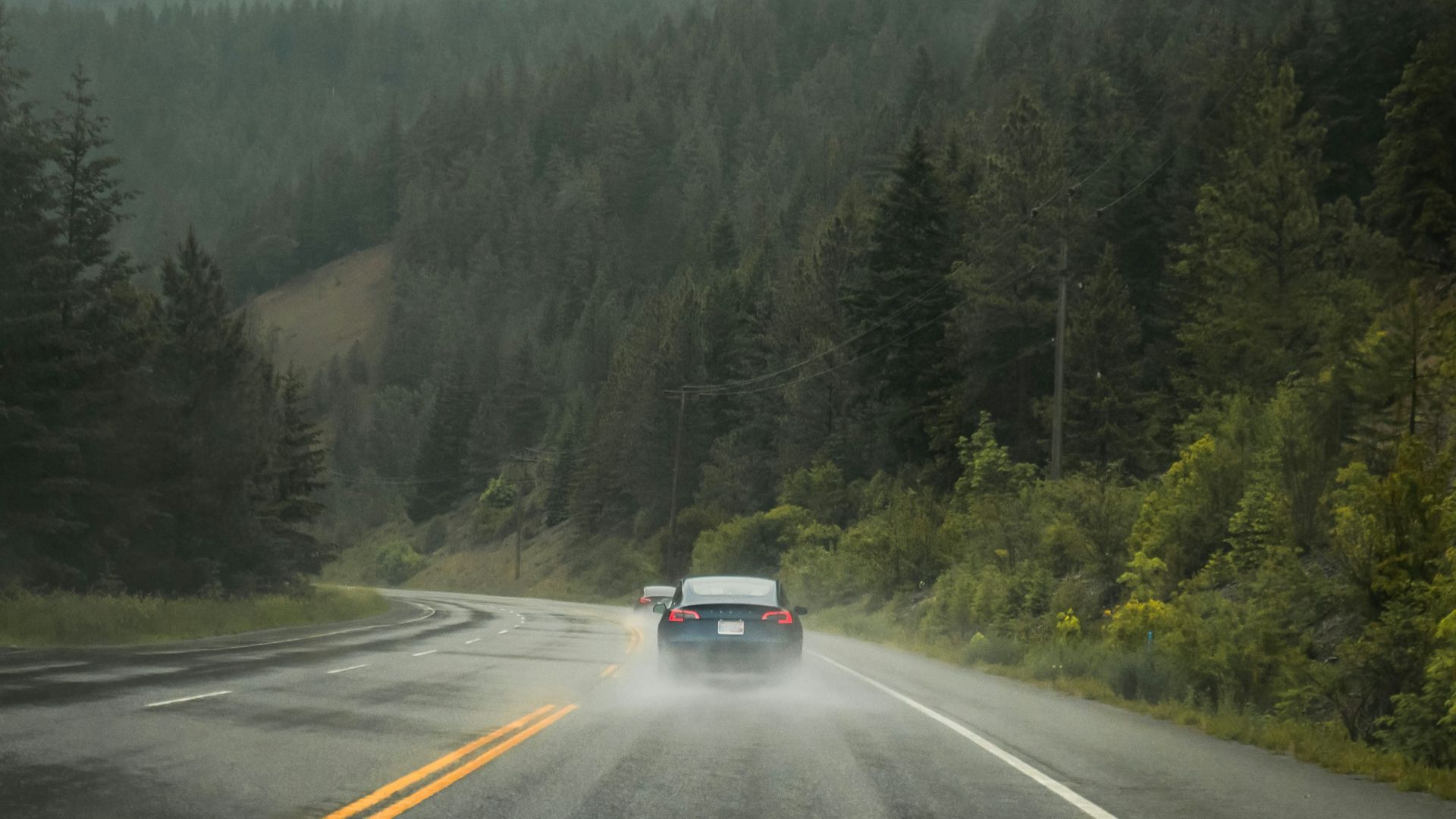 black car on road during daytime