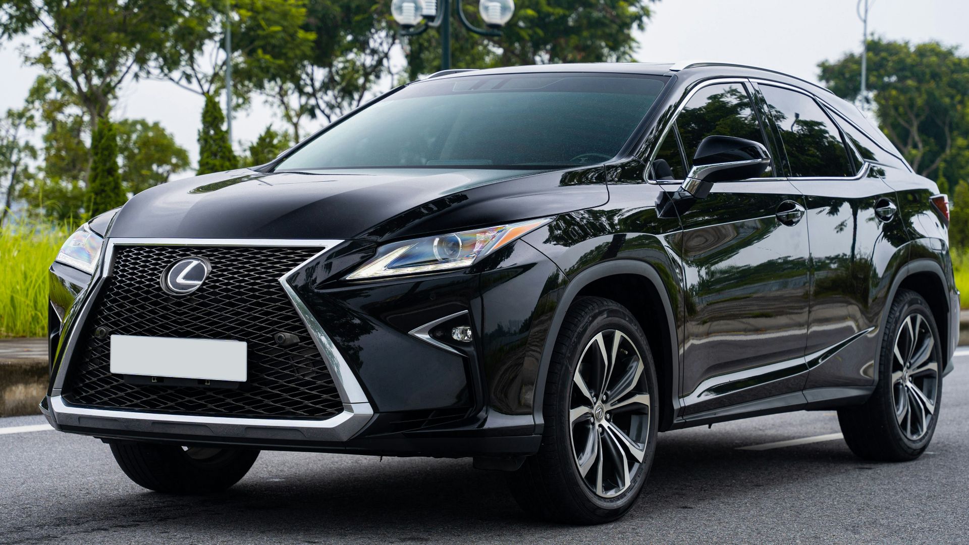 a black car parked on a road
