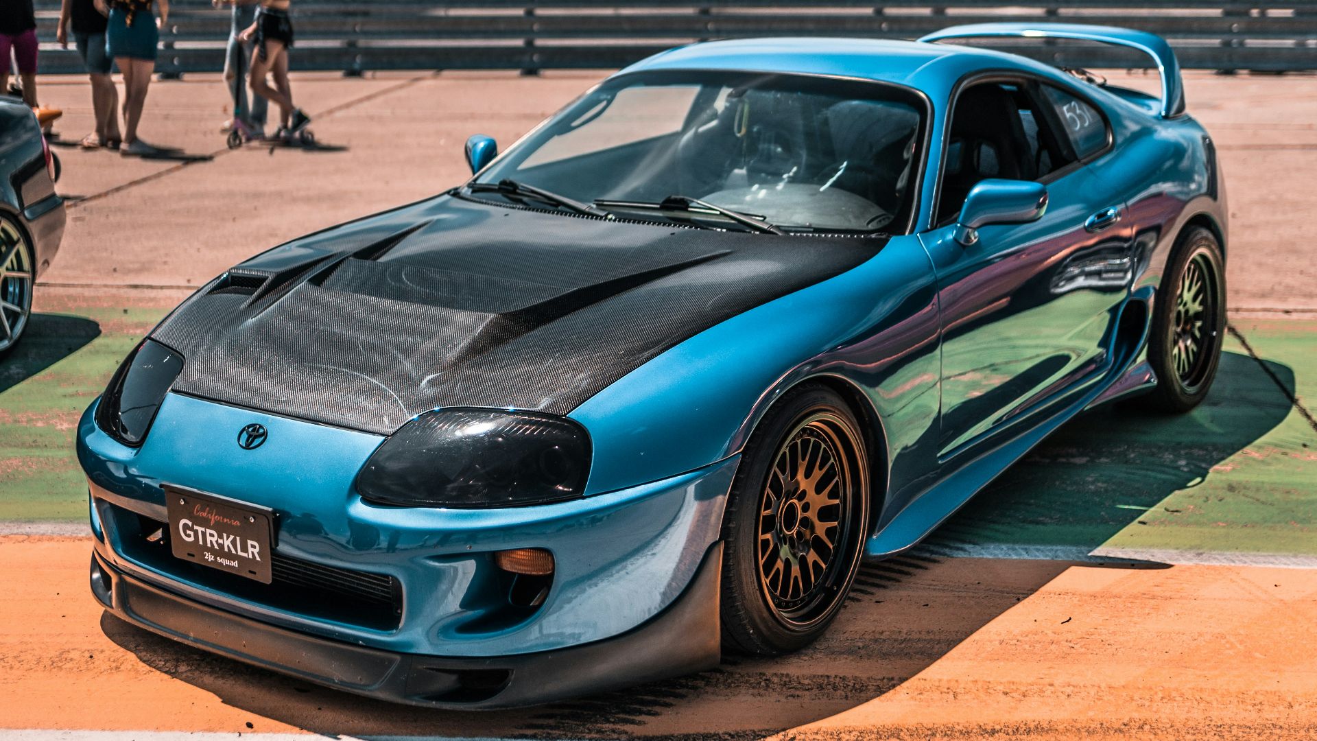 blue bmw m 3 coupe on road during daytime