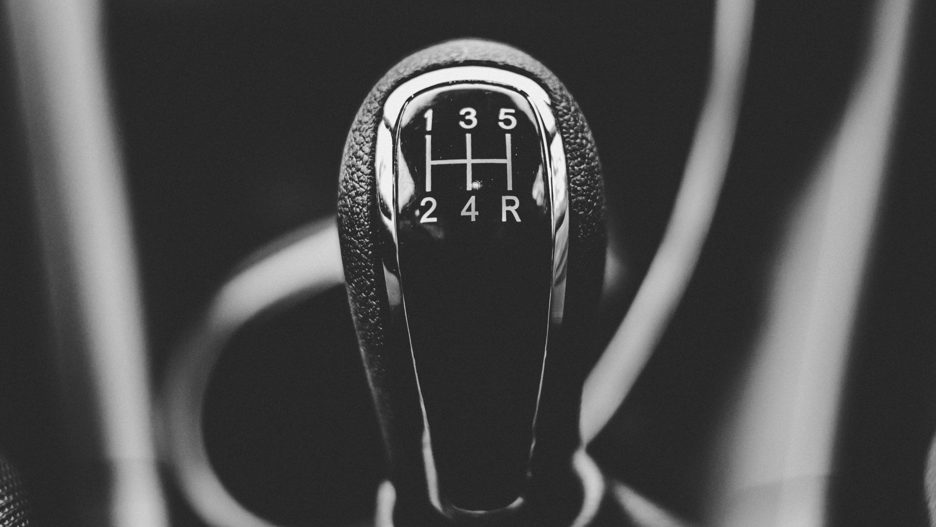 focus photography of car shift gear