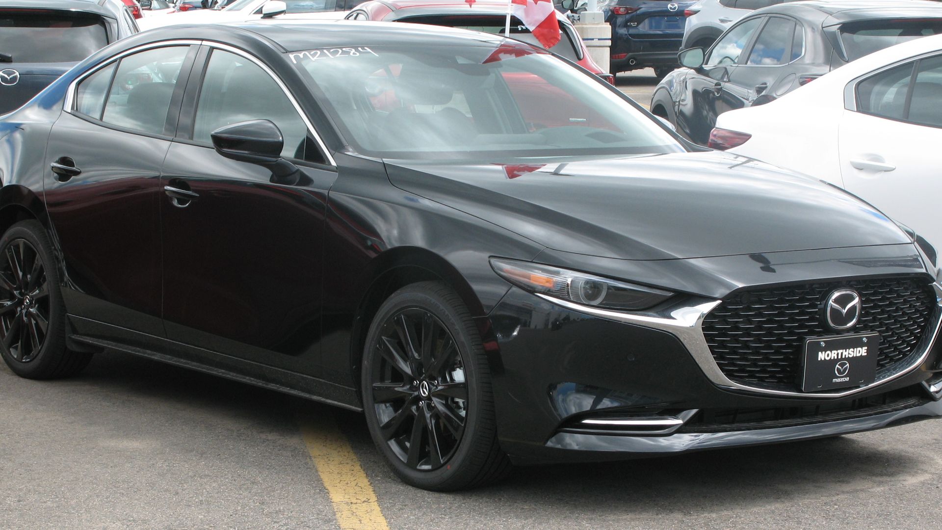 File:2021 Mazda3 GT Turbo AWD, Front Right, 07-01-2021.jpg
