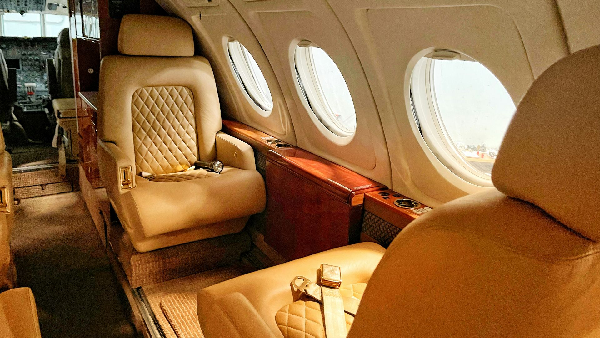 brown leather car seat with white leather seat