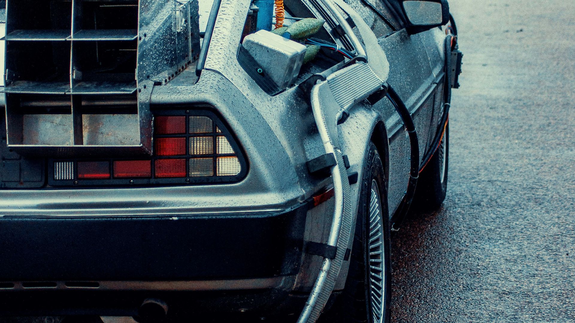 a back view of a delore of cars parked on the street