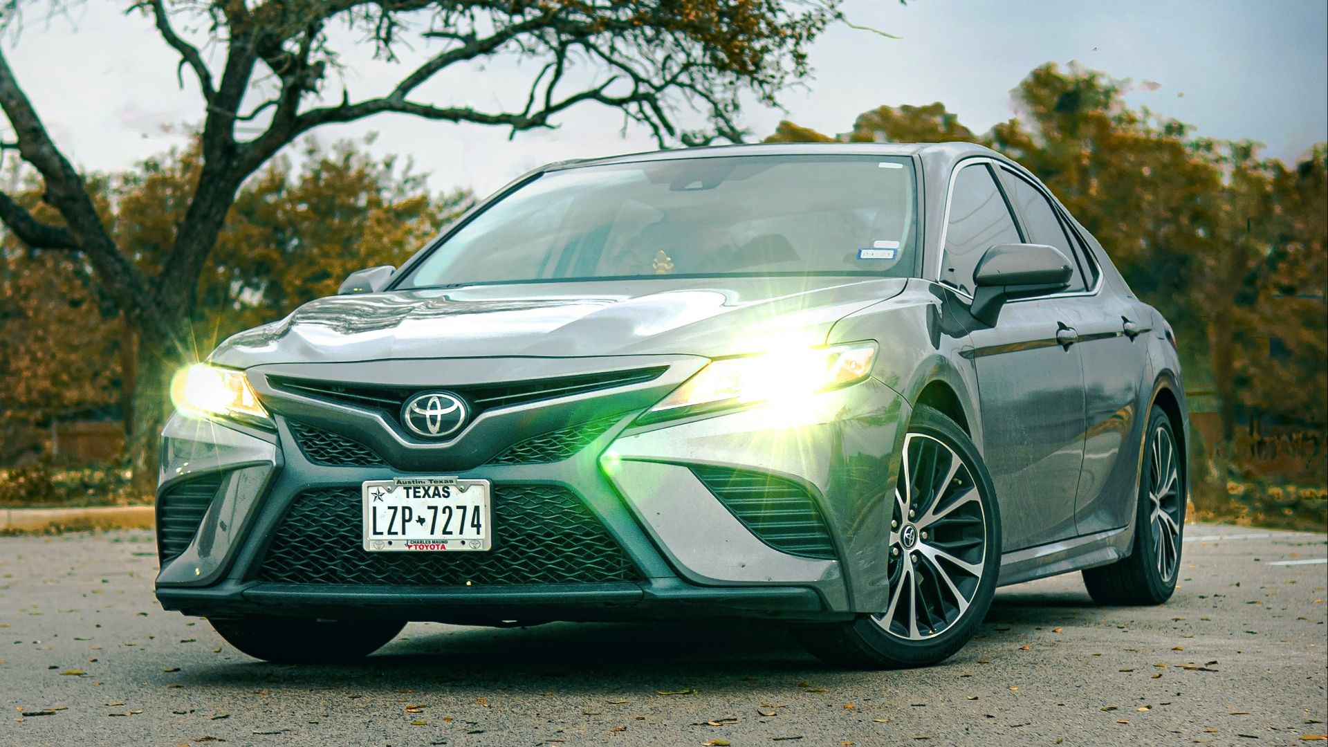 green mercedes benz coupe on road during daytime