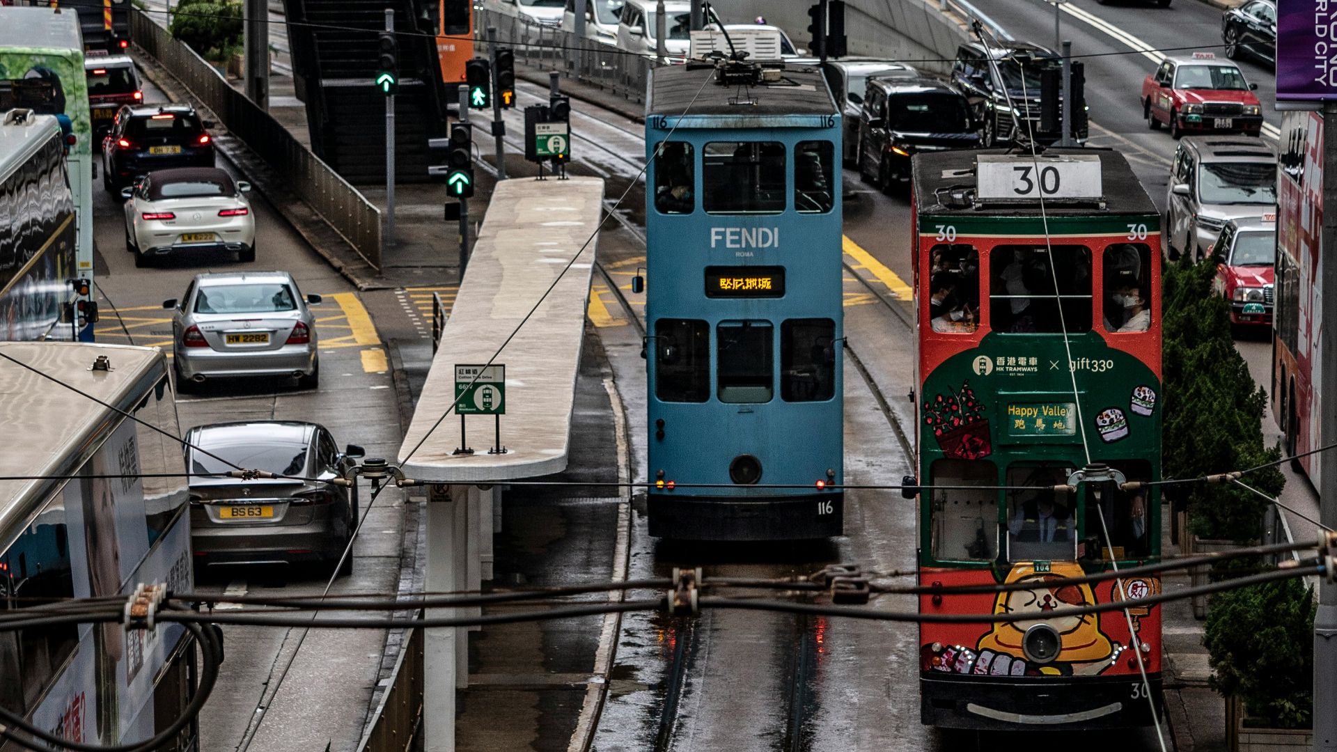 a city street filled with lots of traffic