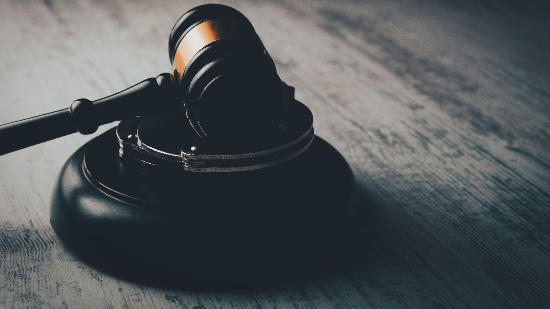 a judge's gaven on a wooden table