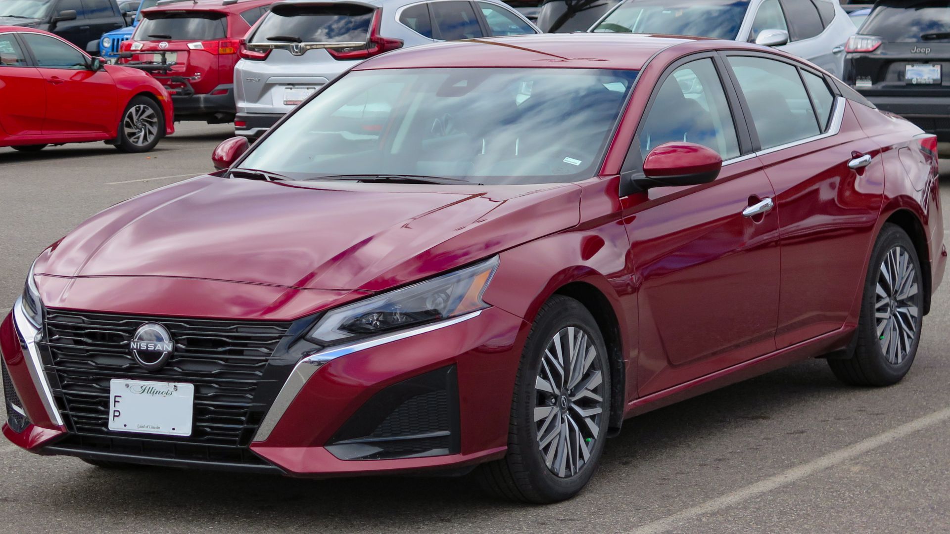 File:2023 Nissan Altima SV in Scarlet Ember Tintcoat, Front Left, 09-12-2023.jpg