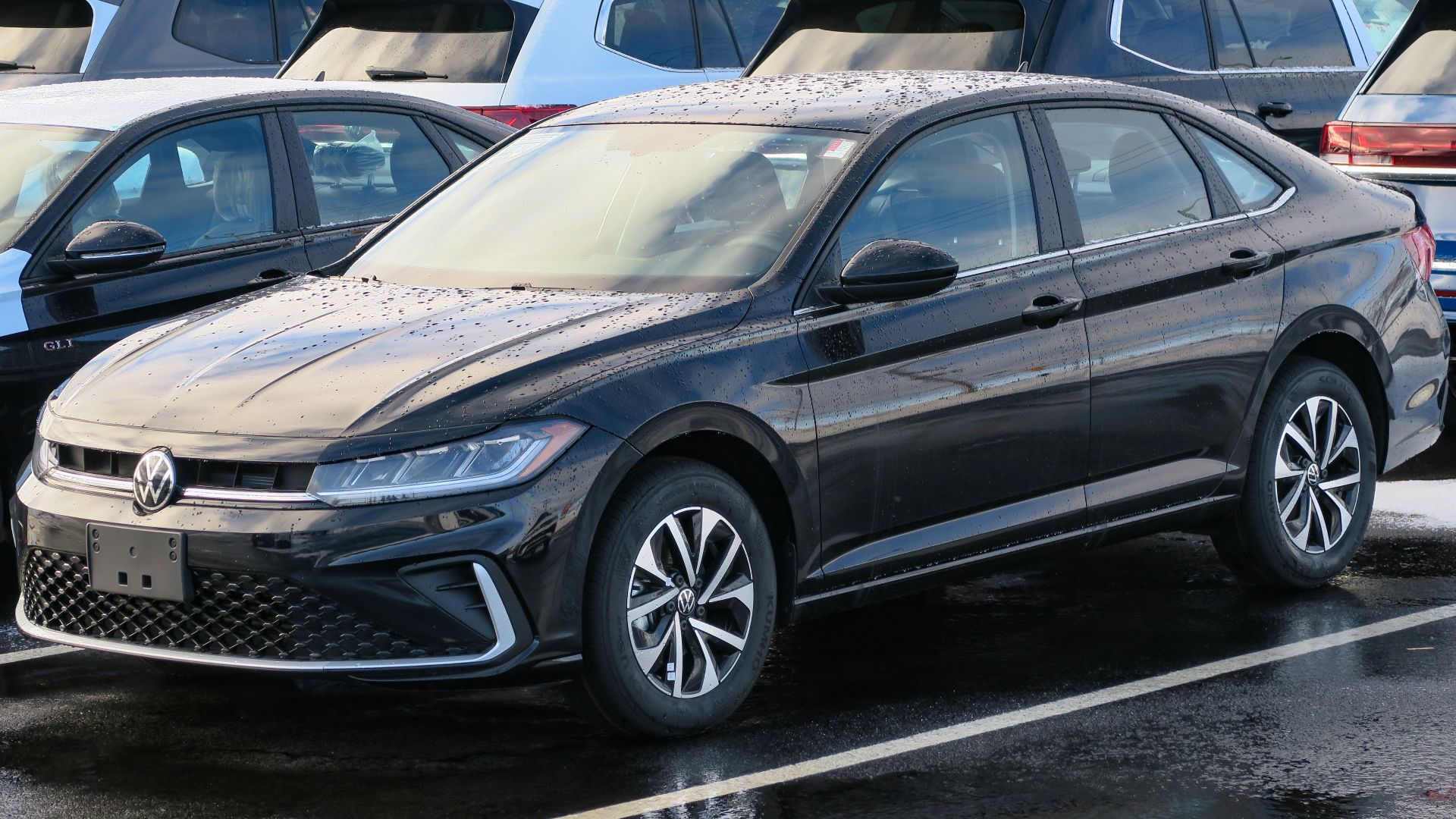 File:2025 Volkswagen Jetta Trendline in Deep Black Pearl, front left, 2024-12-31.jpg