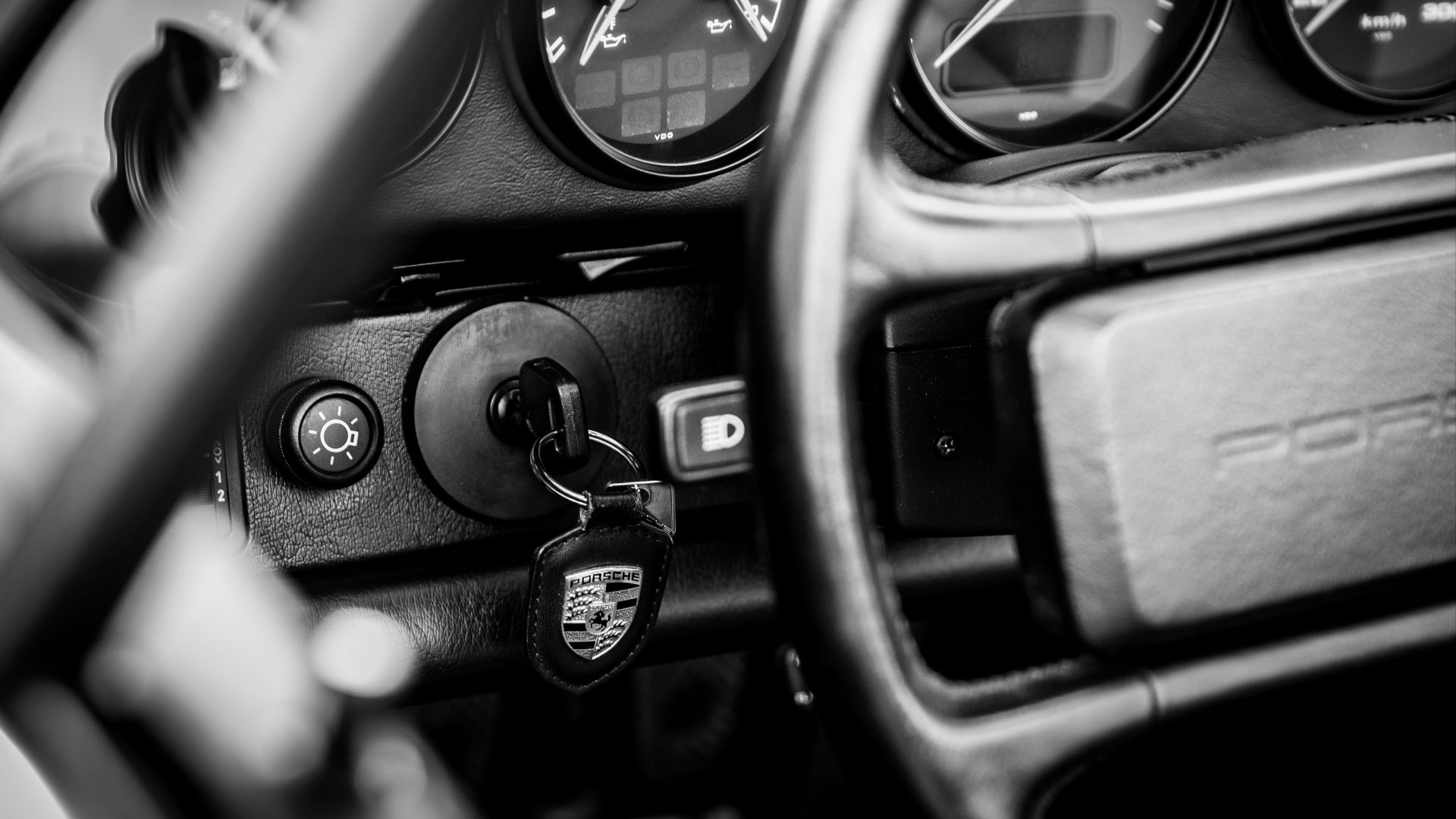 a steering wheel and dashboard of a car