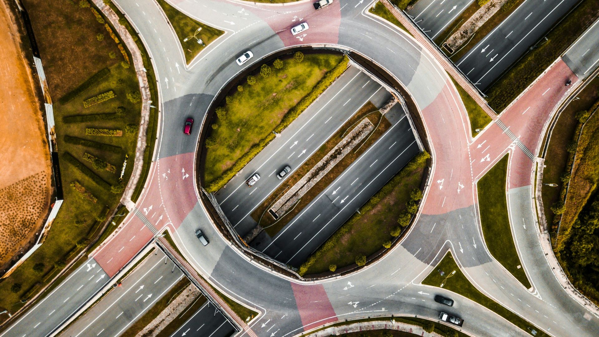 aerial photography of vehicles running on vehicle intersection route at daytime