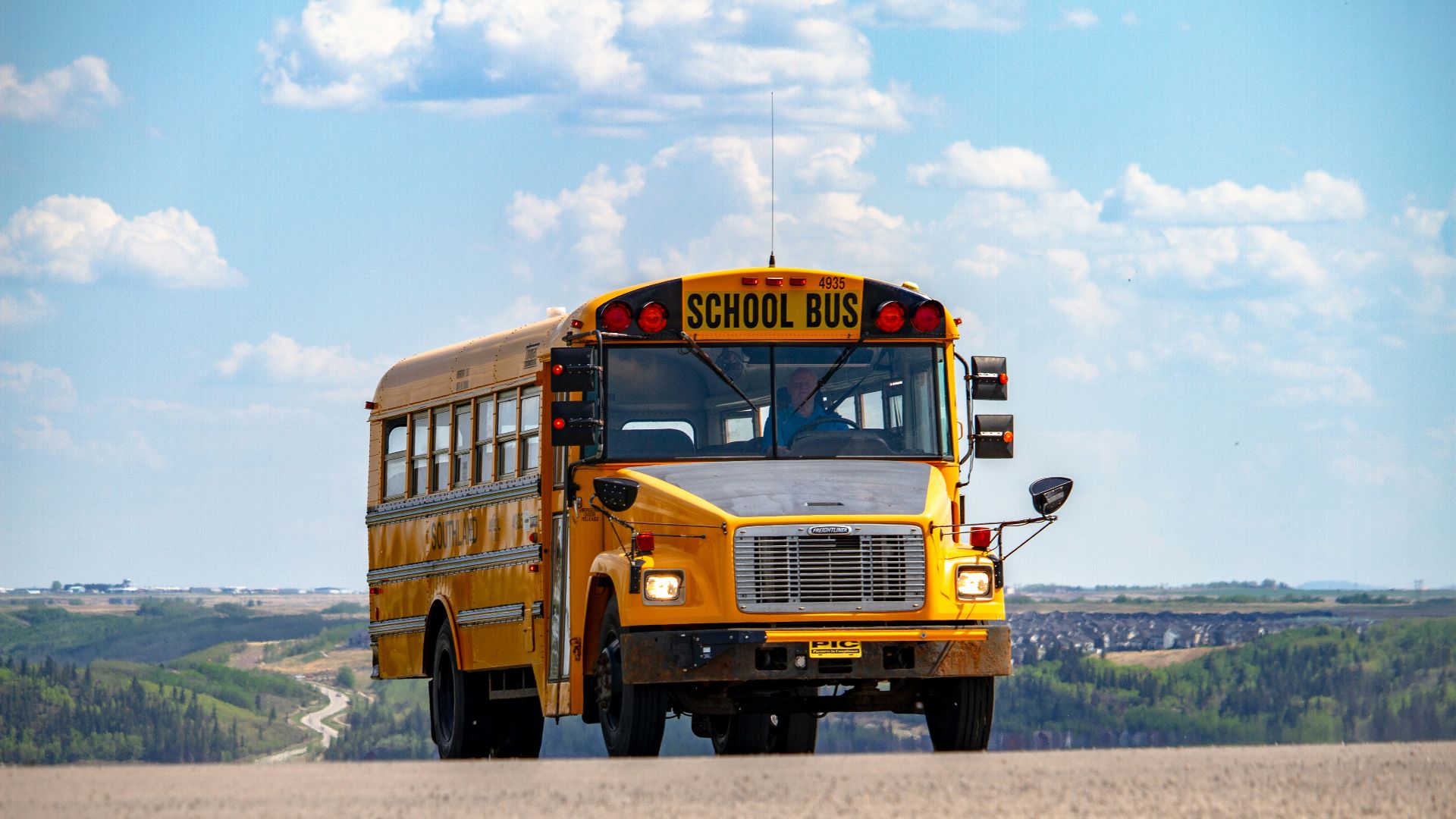 school bus on pathway
