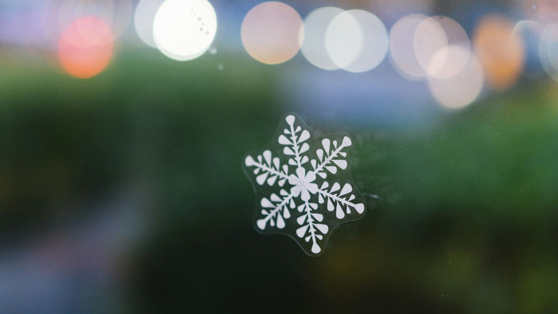 A close up of a snowflake on a window