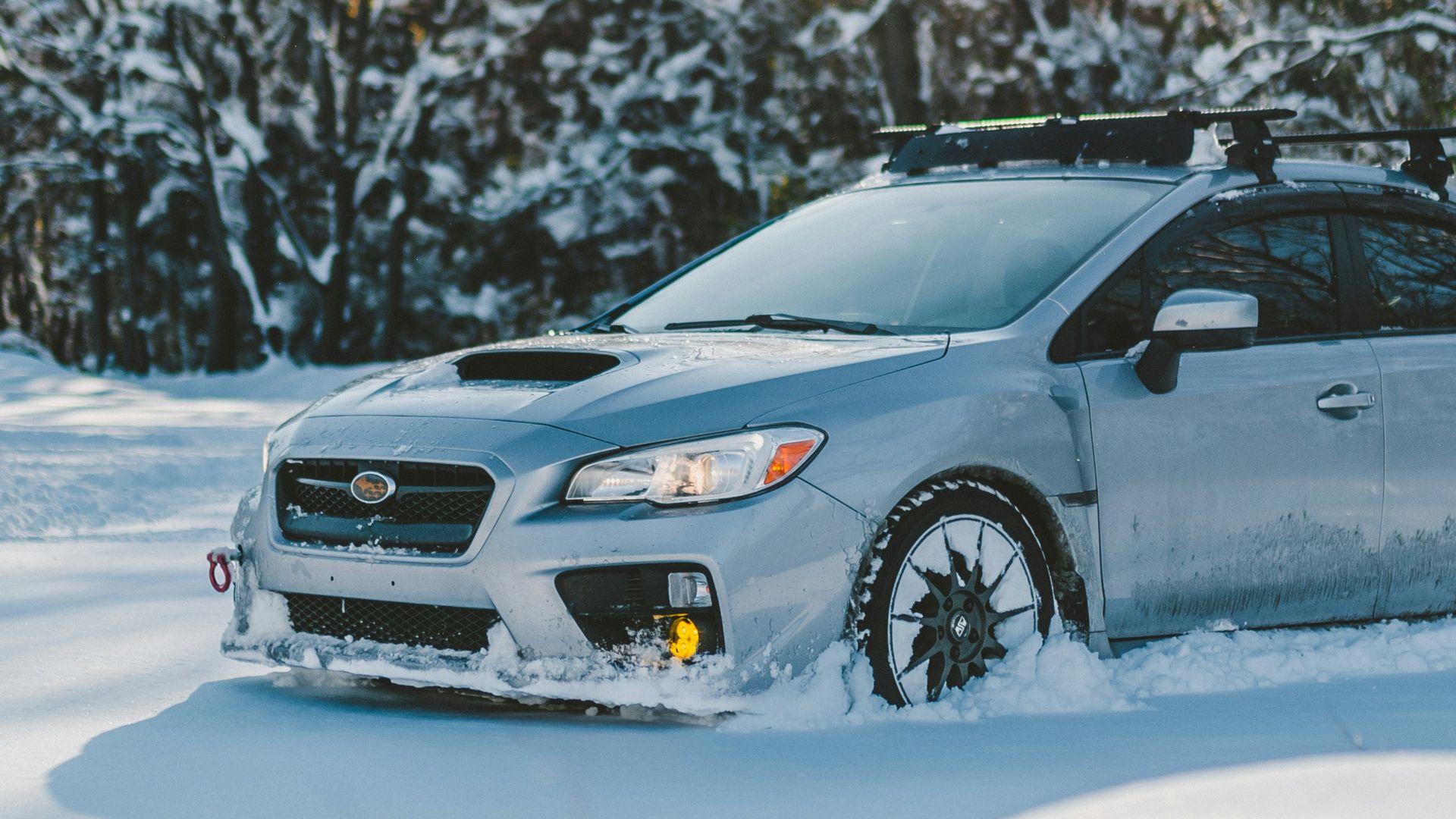 a car parked in the snow