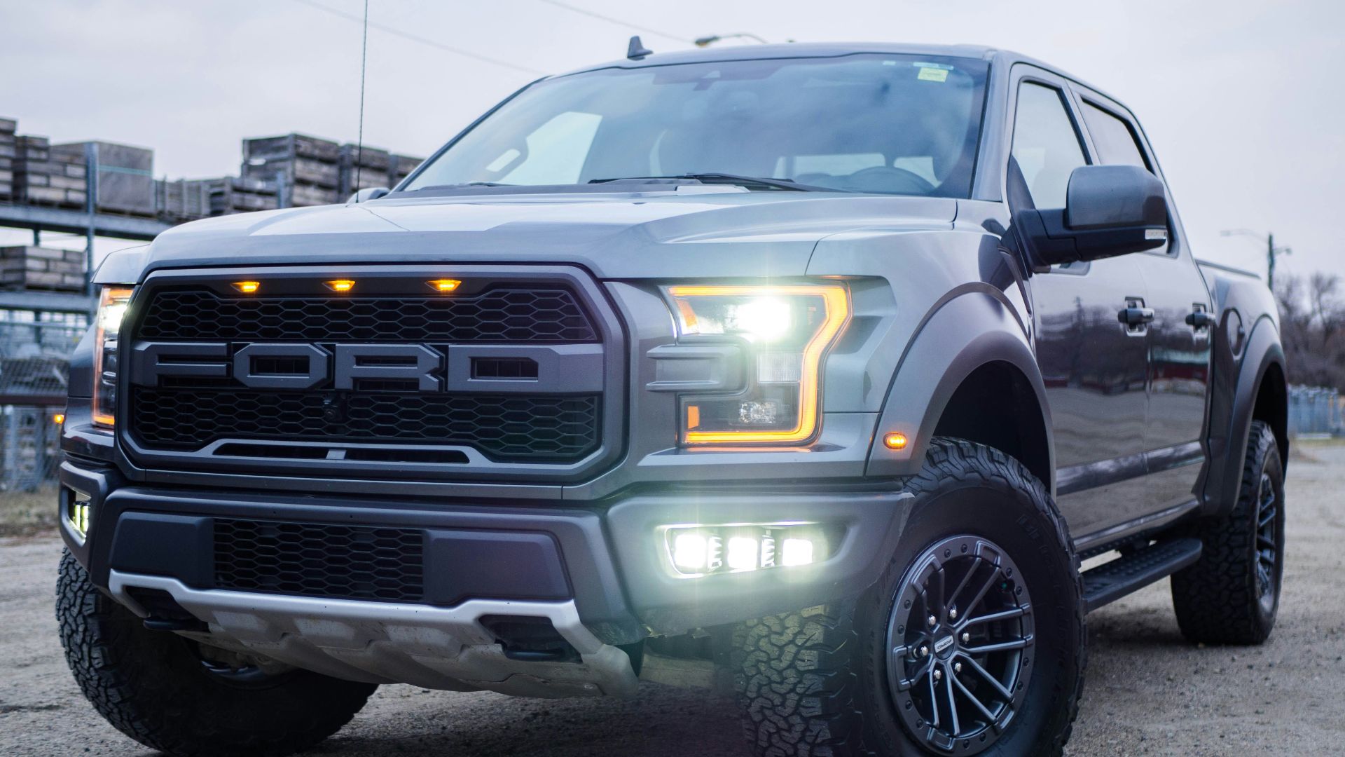 black chevrolet crew cab pickup truck on road during daytime