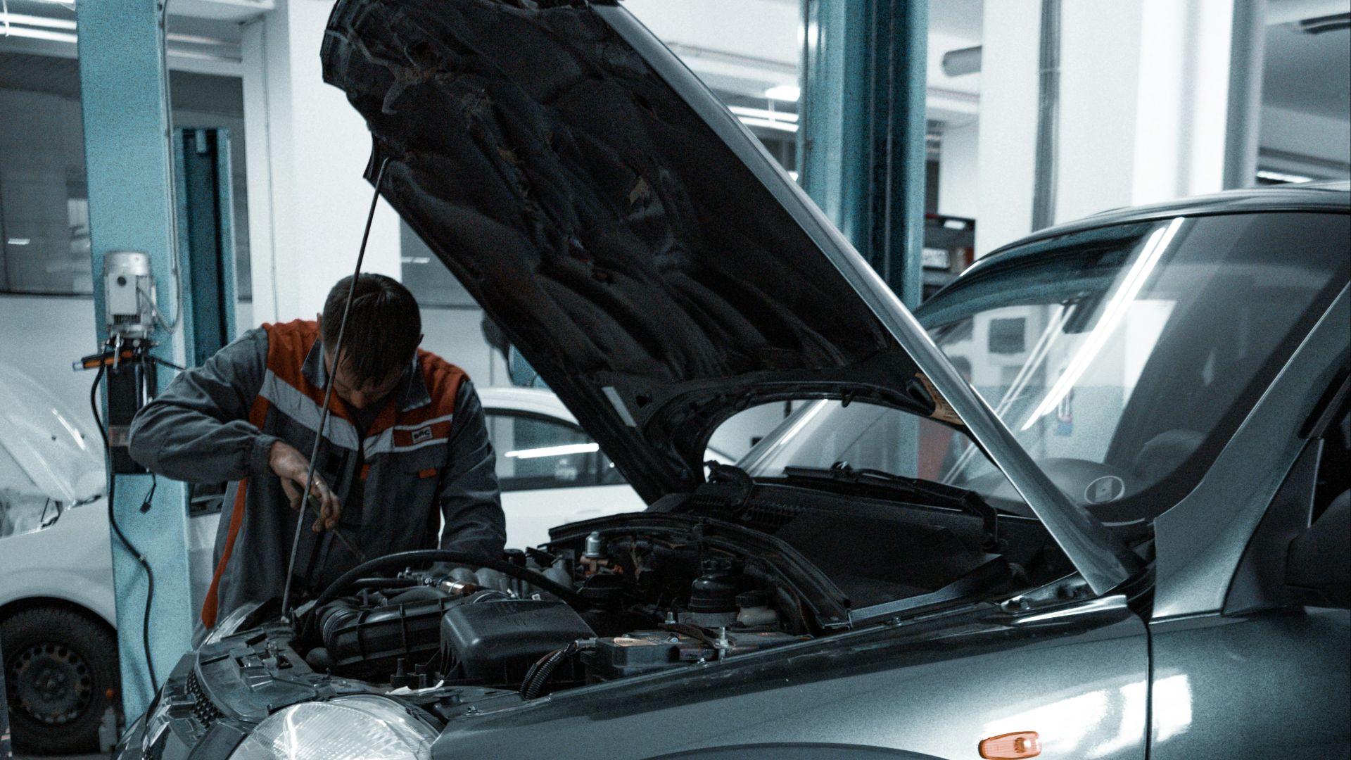 black suv in a garage