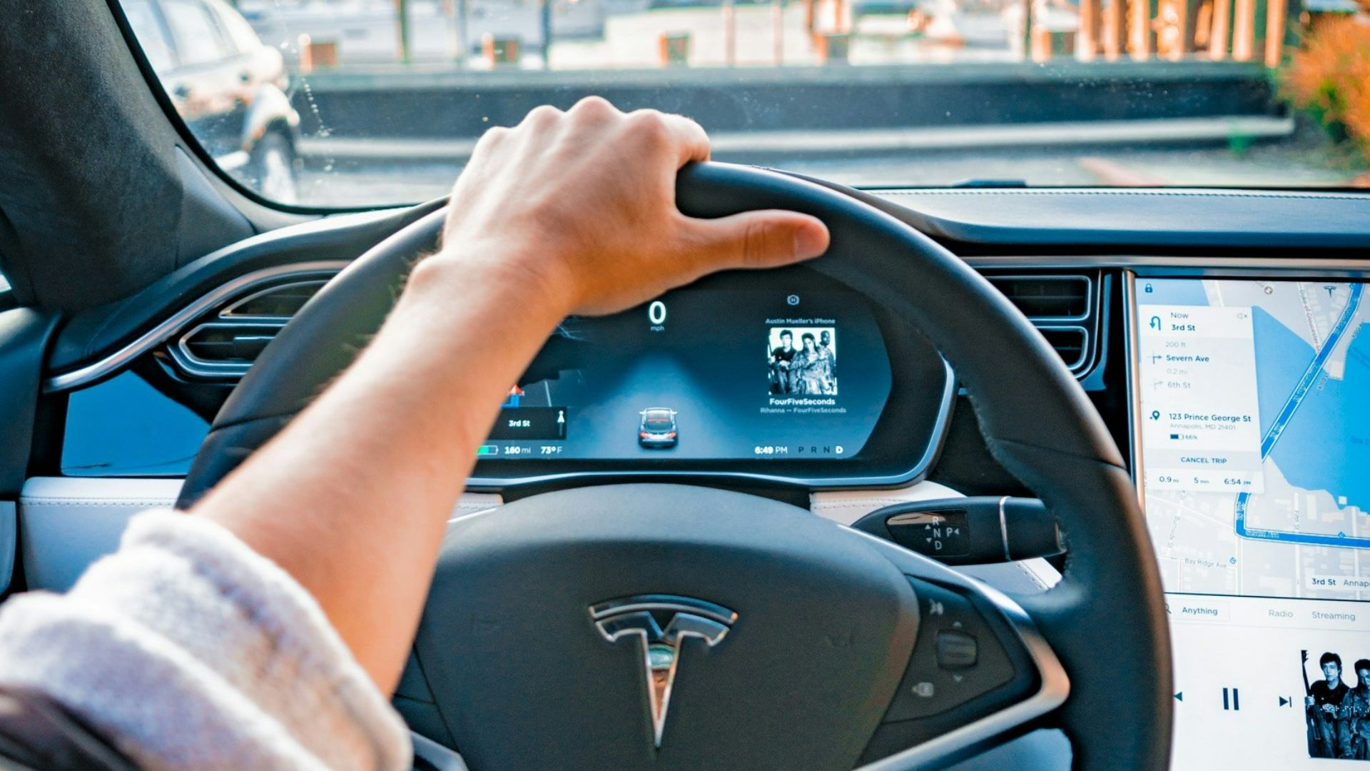 person driving car during daytime