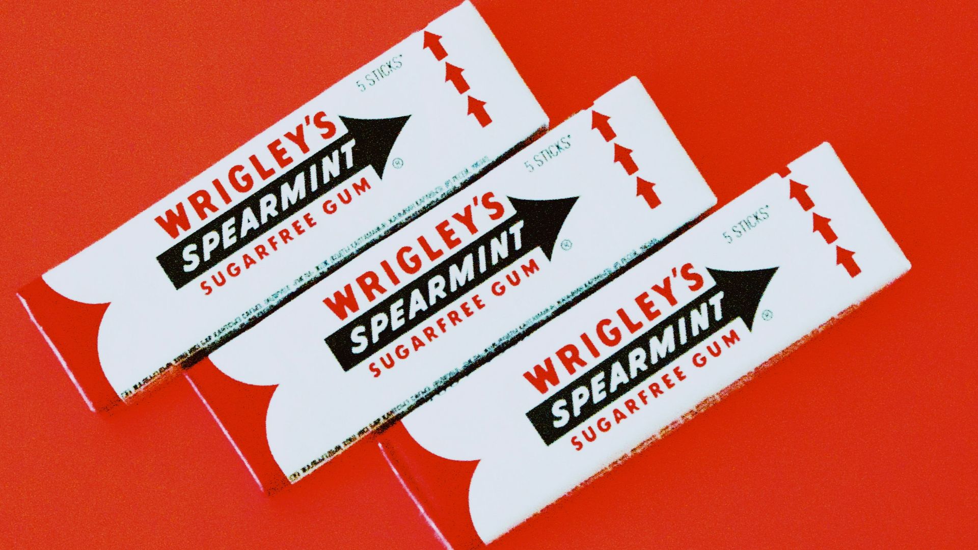 three Wrigley's spearmint gum packs