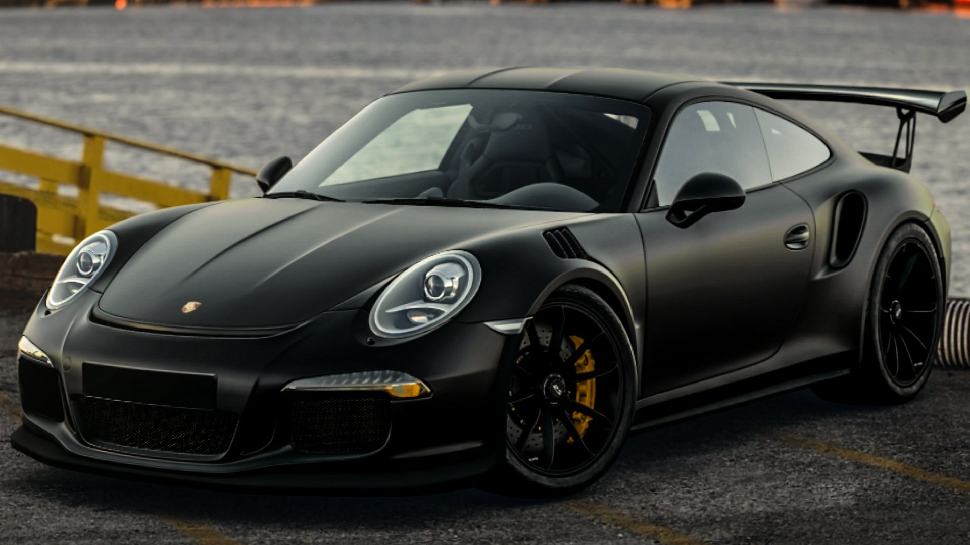 black porsche 911 on road during daytime