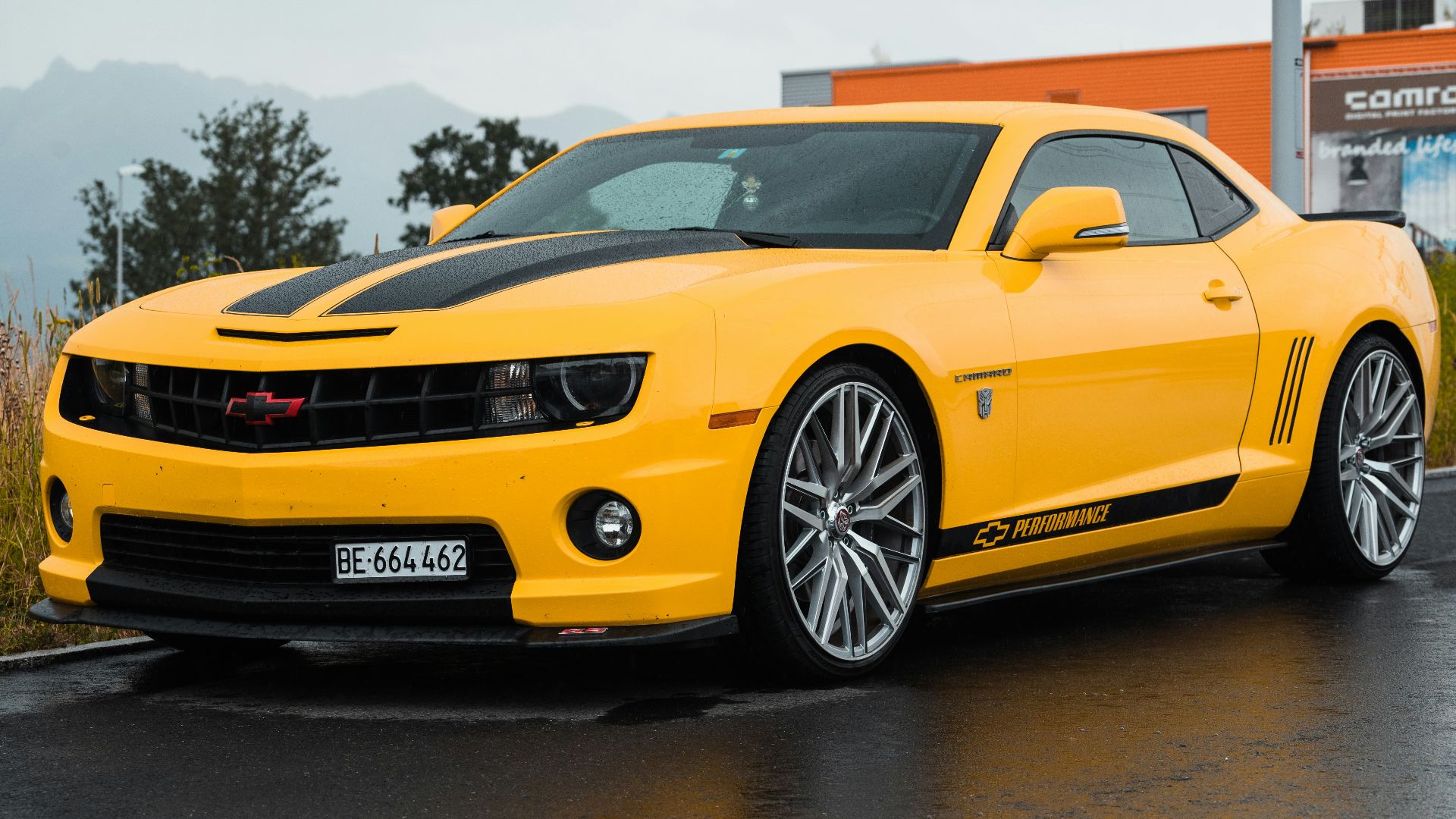 yellow Chevrolet coupe close-up photography