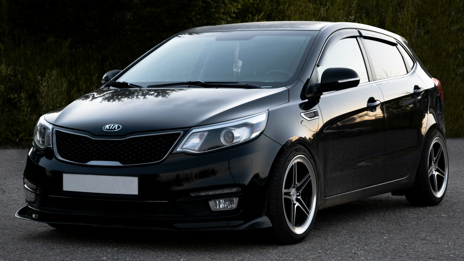 black mercedes benz c class on road during daytime