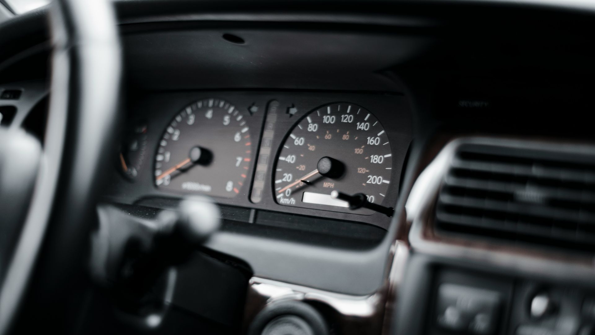 black and gray car instrument panel cluster