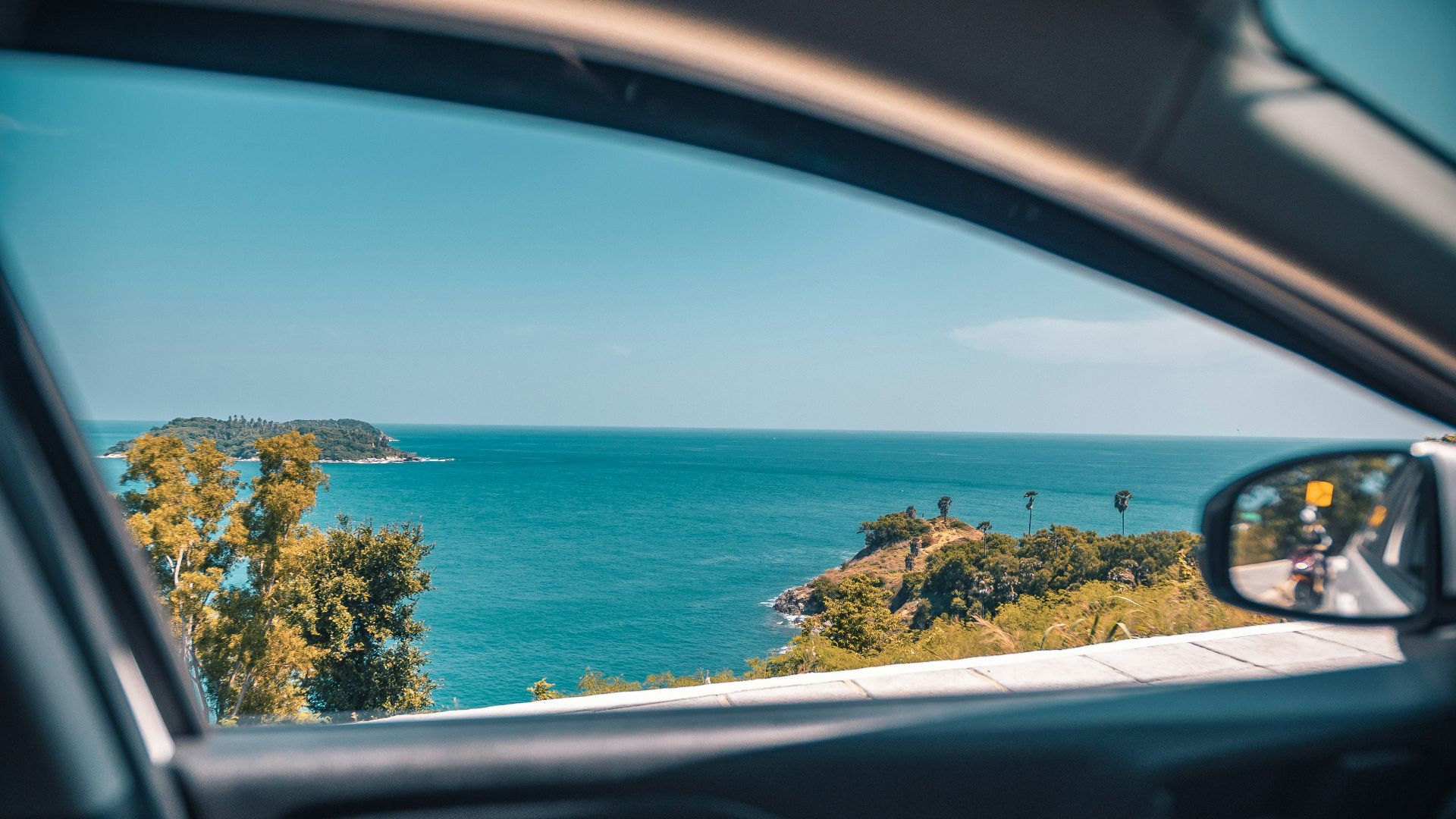 coastal view through vehicle window