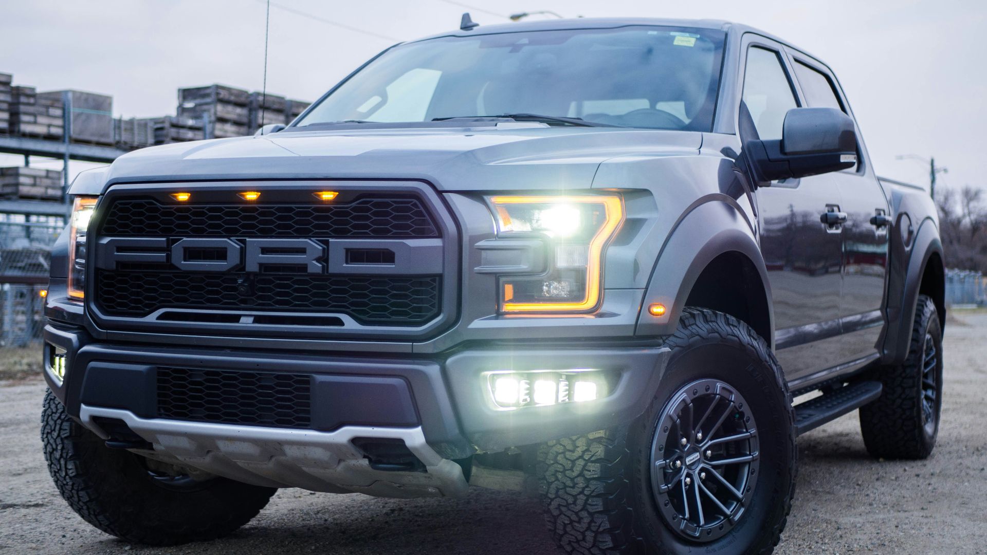 black chevrolet crew cab pickup truck on road during daytime