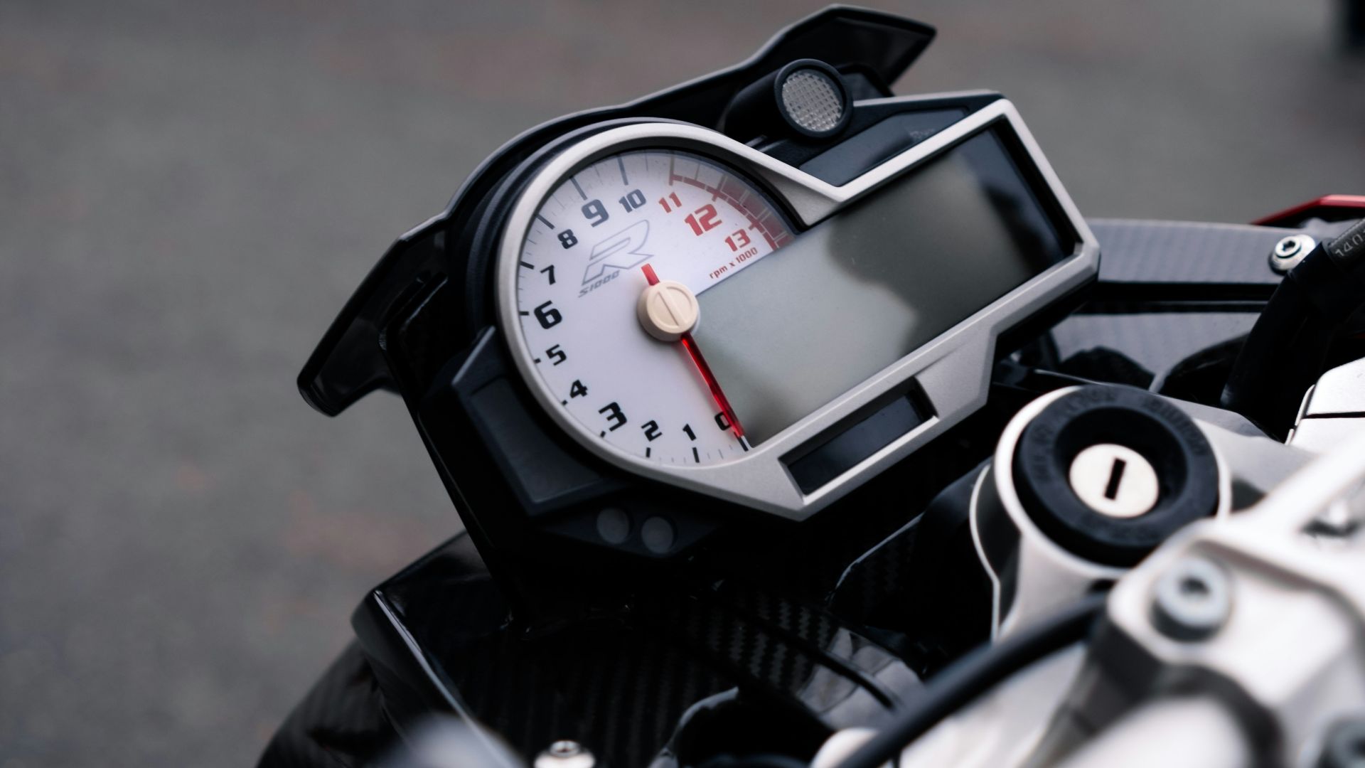 black and silver motorcycle speedometer