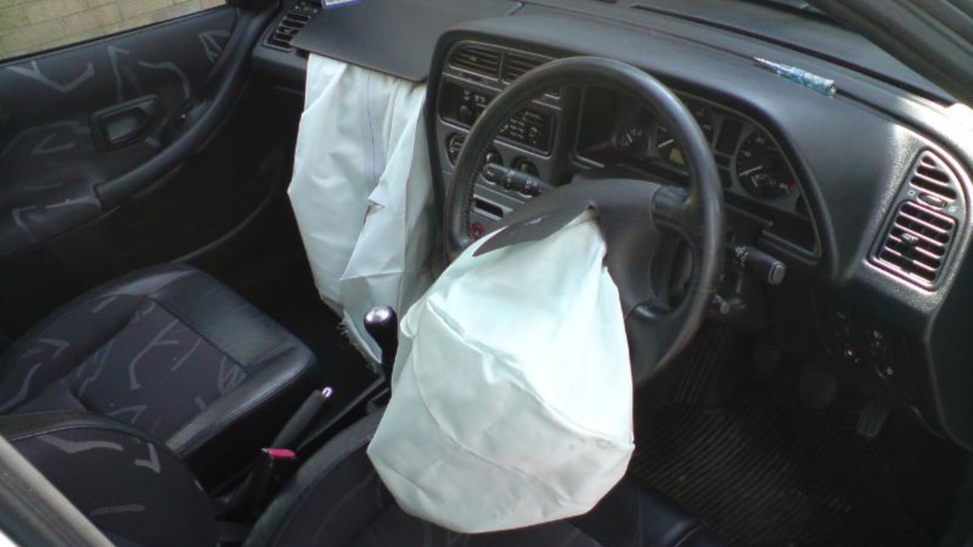 File:Peugeot 306 airbags deployed.jpg