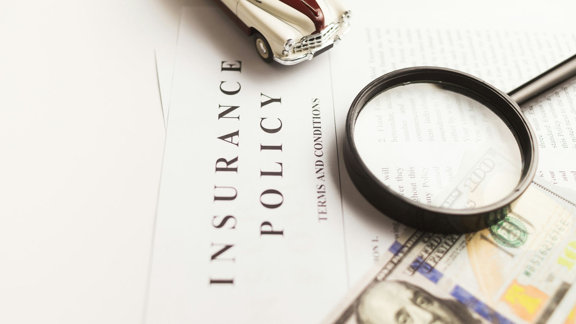 a magnifying glass sitting on top of a piece of paper