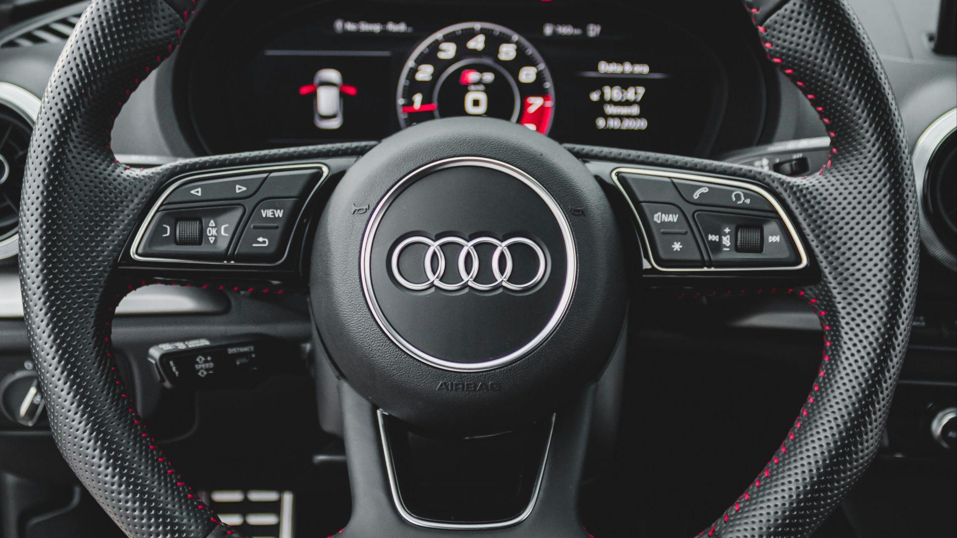 black and gray audi steering wheel
