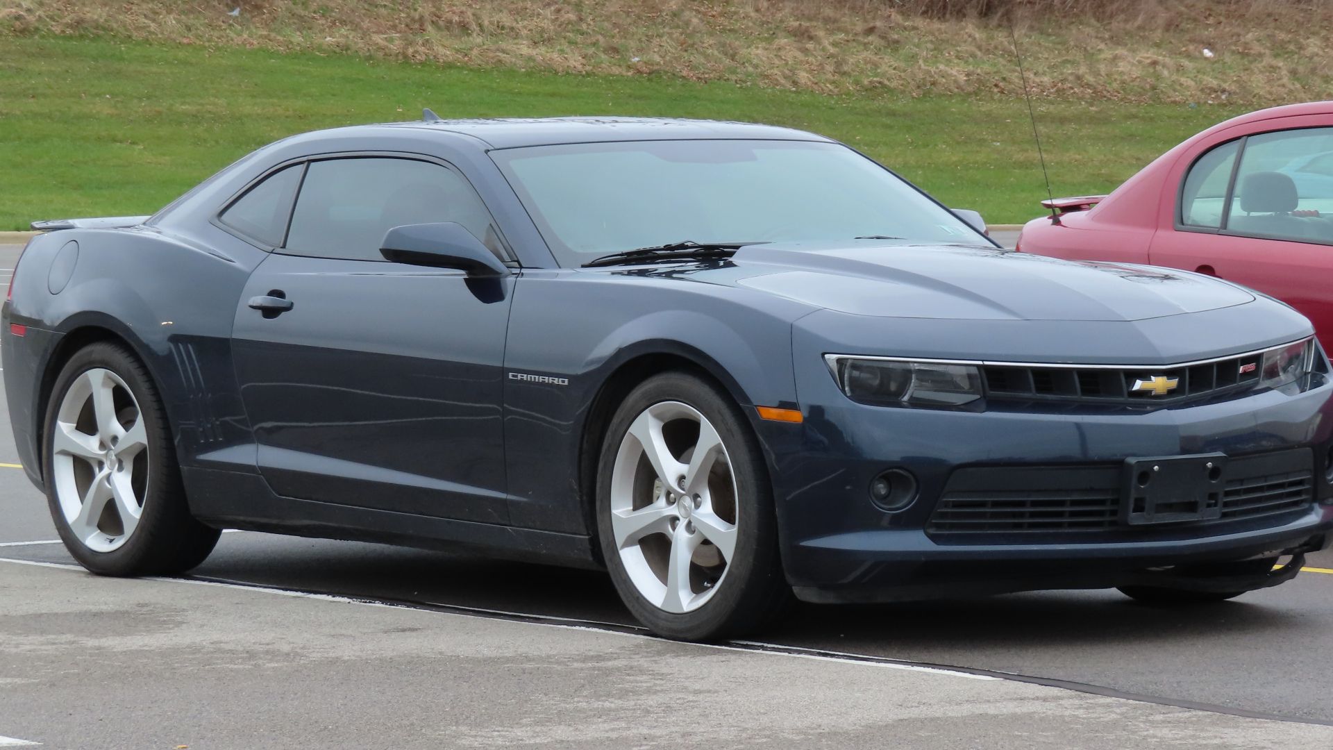 File:2015 Chevrolet Camaro 2LT RS coupe, front right, 03-15-2024.jpg