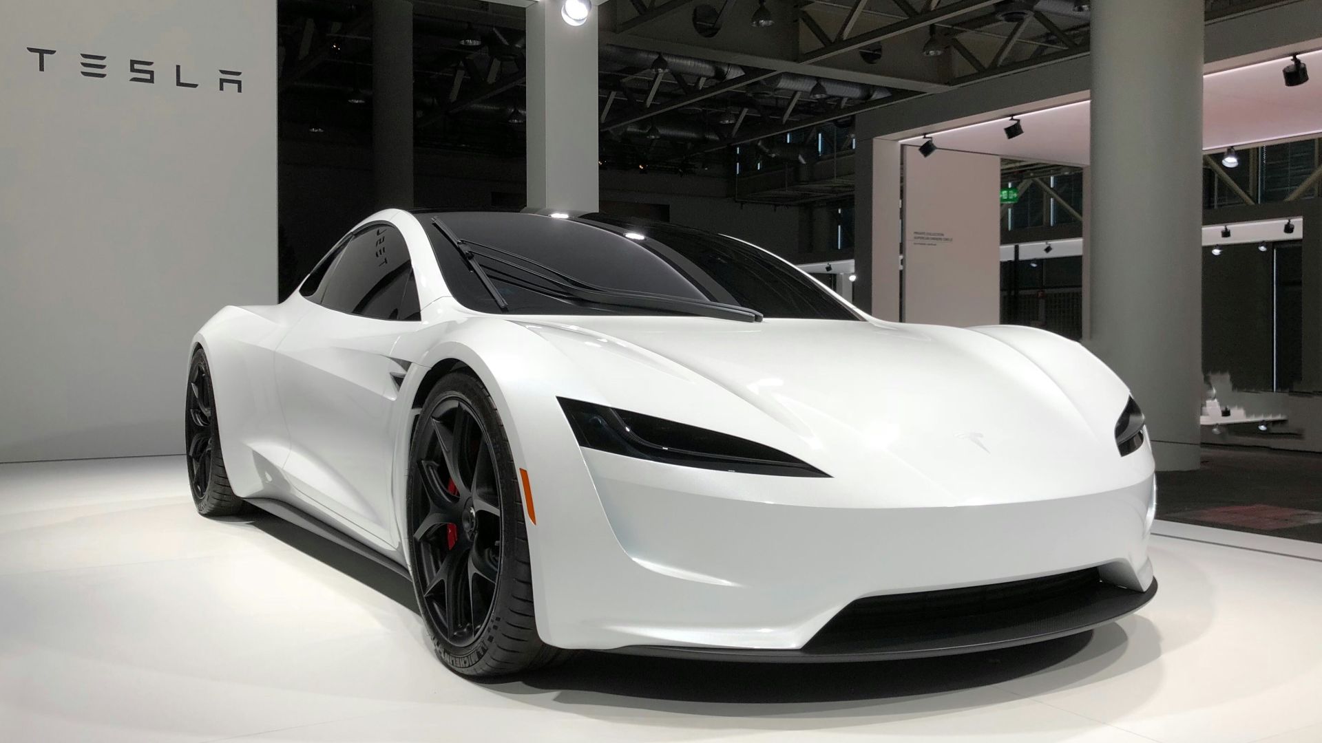 white lamborghini aventador parked in building