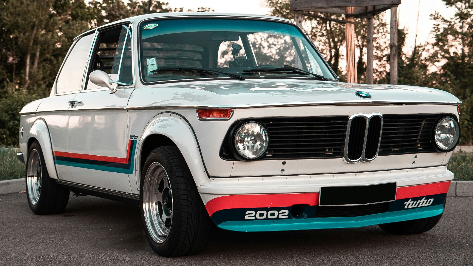 a white car parked on a road