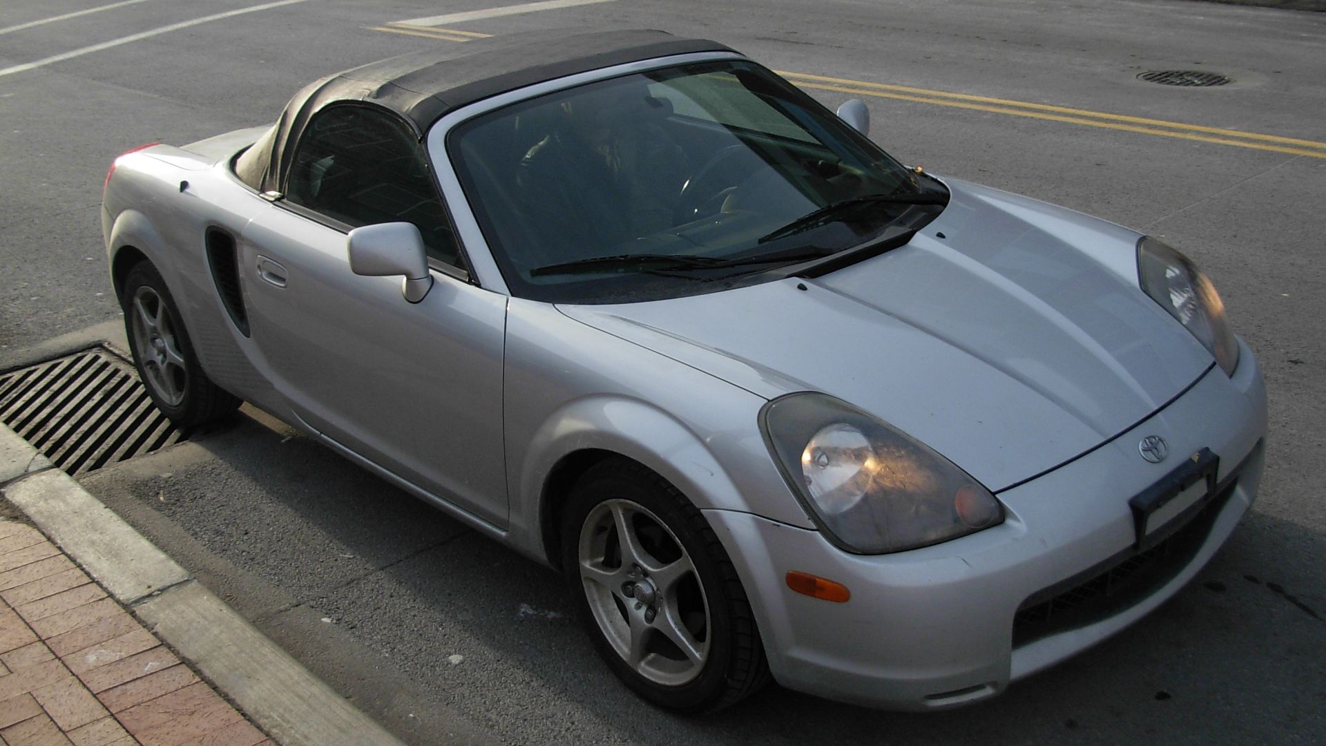 File:Silver car with a black top.JPG