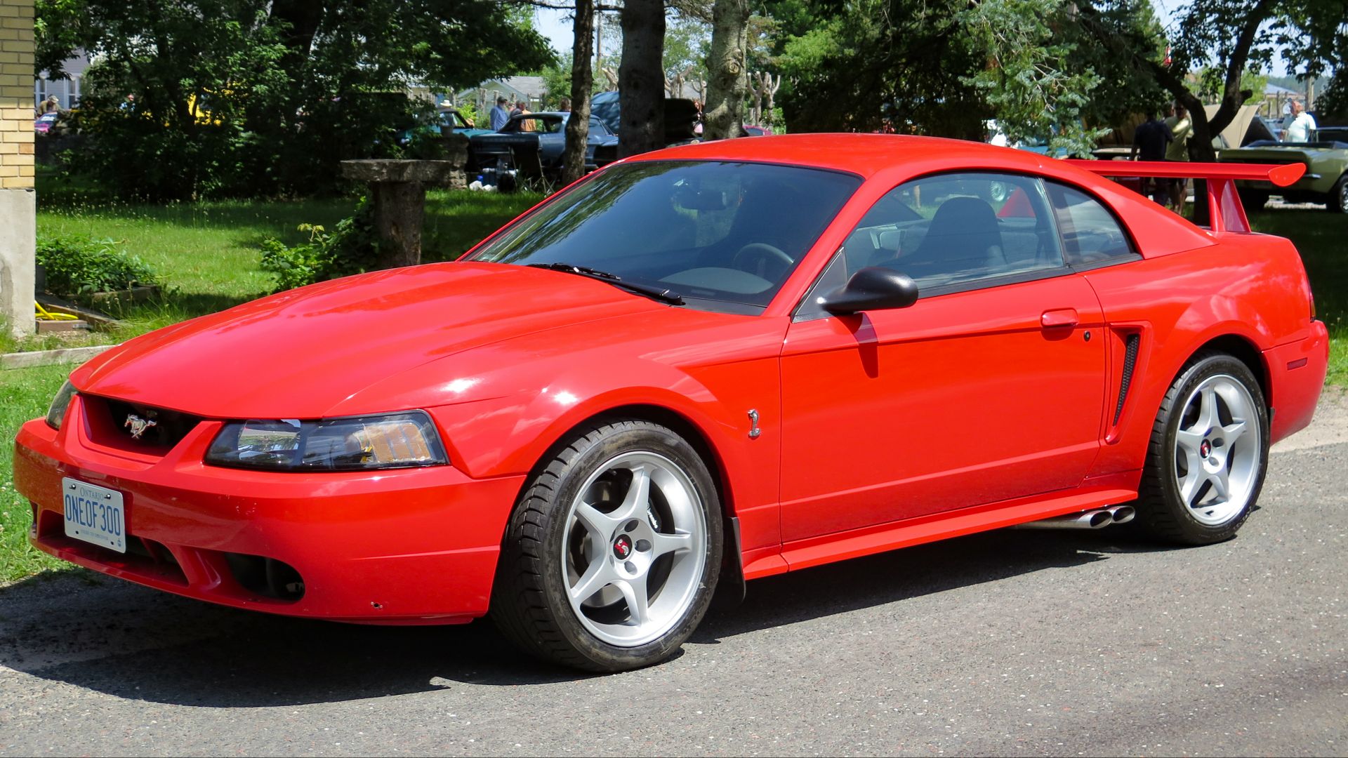 File:2000 Ford Mustang SVT Cobra R in Performance Red, Front Left (Hilton Beach 2023).jpg