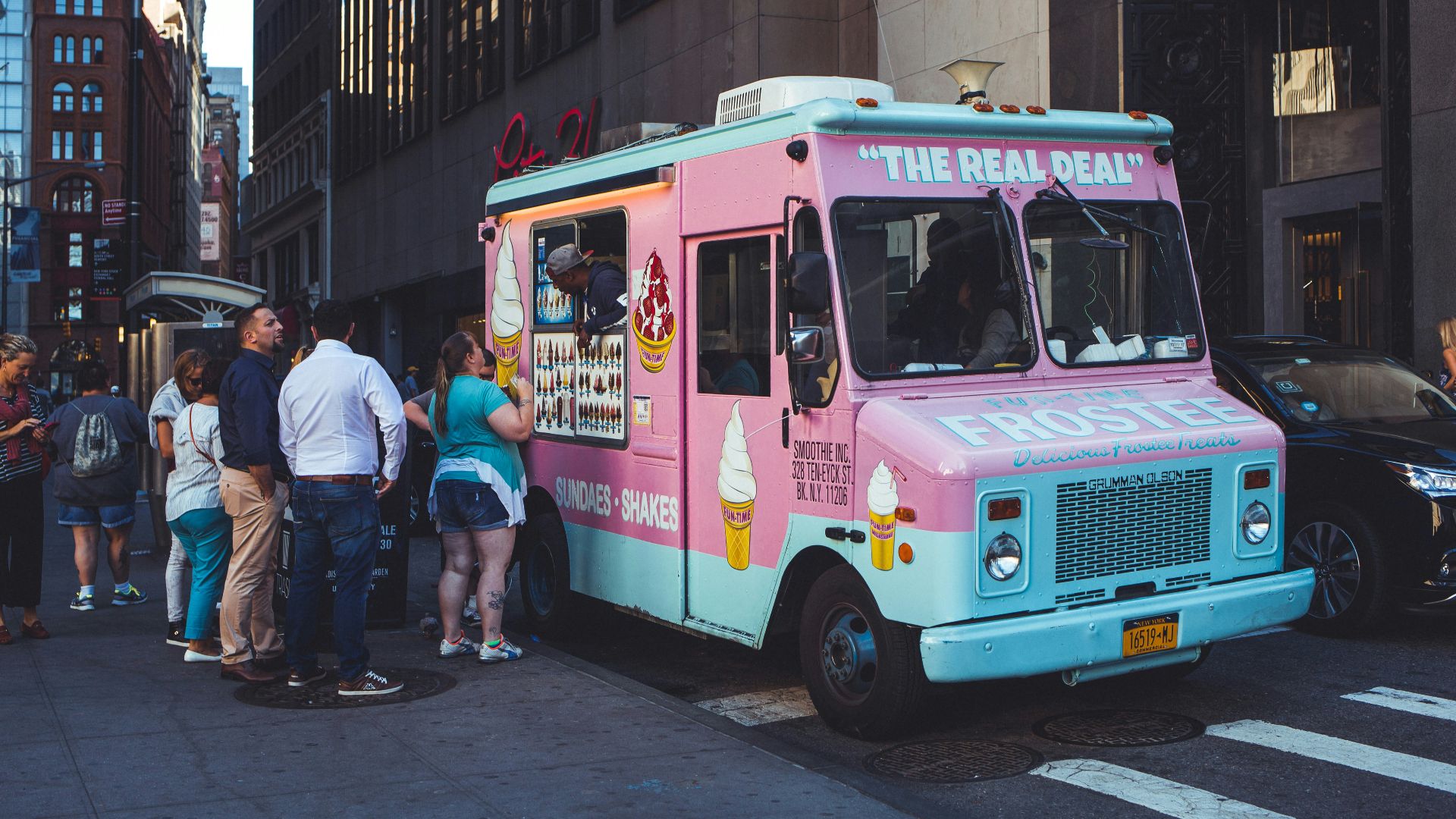 people walking on street during night time