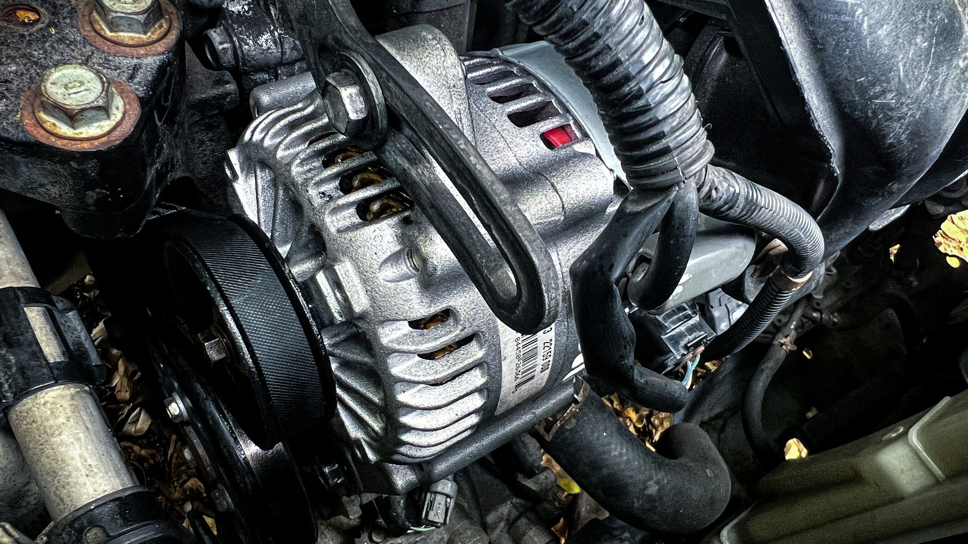 a car engine with a black hood