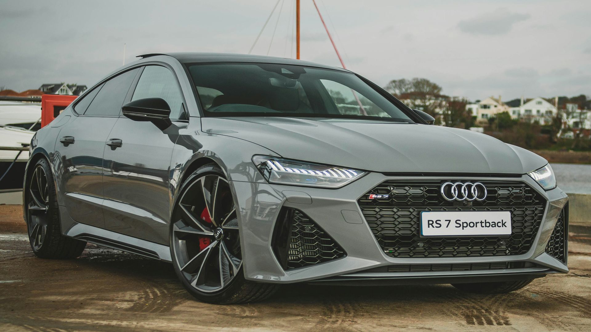 silver mercedes benz coupe on brown sand during daytime