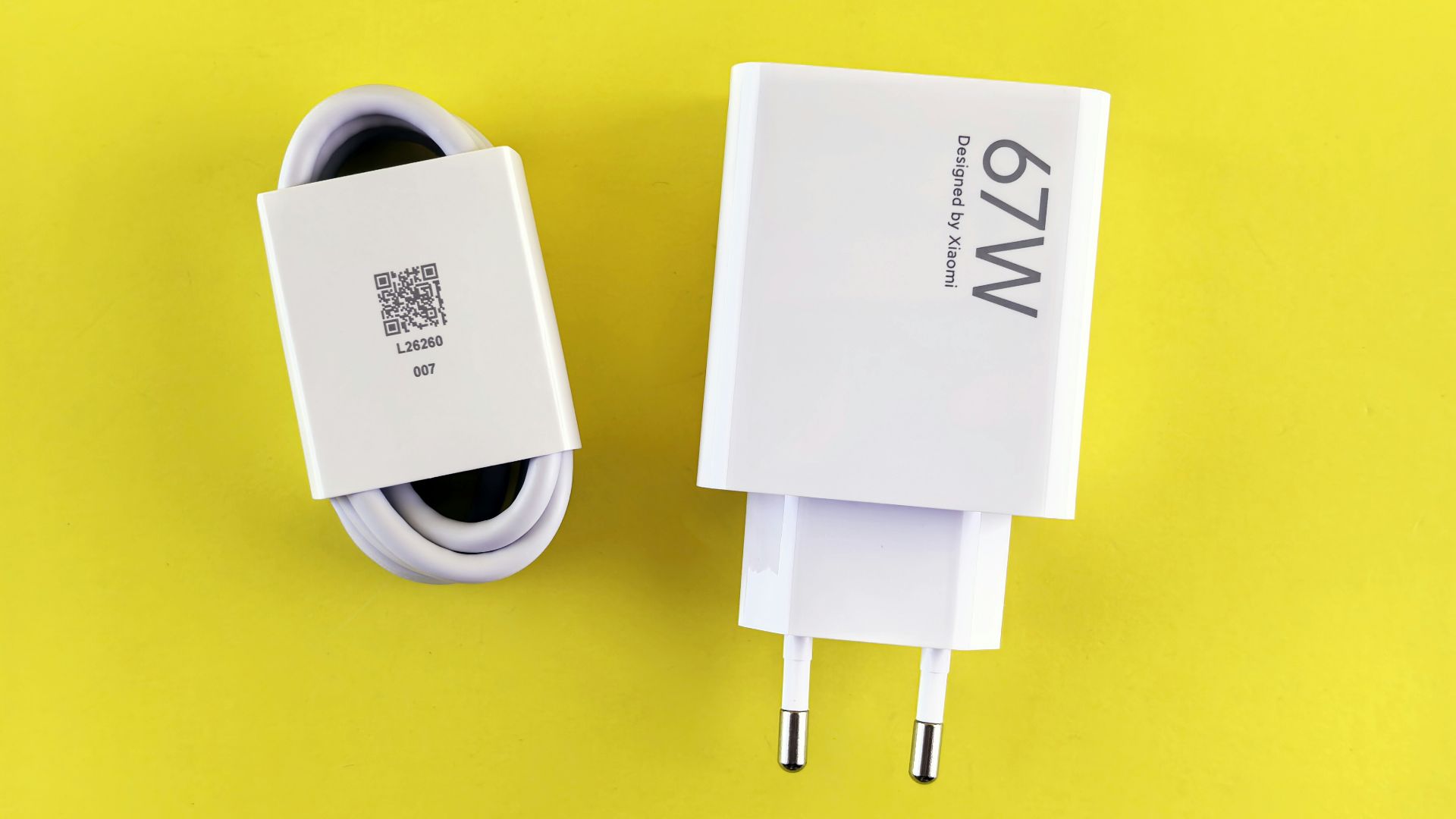 A couple of white wires sitting next to each other