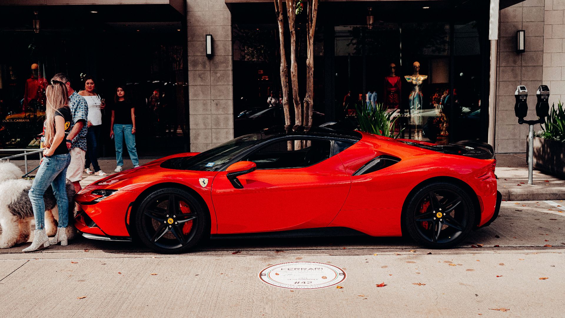 a group of people riding on the back of a car