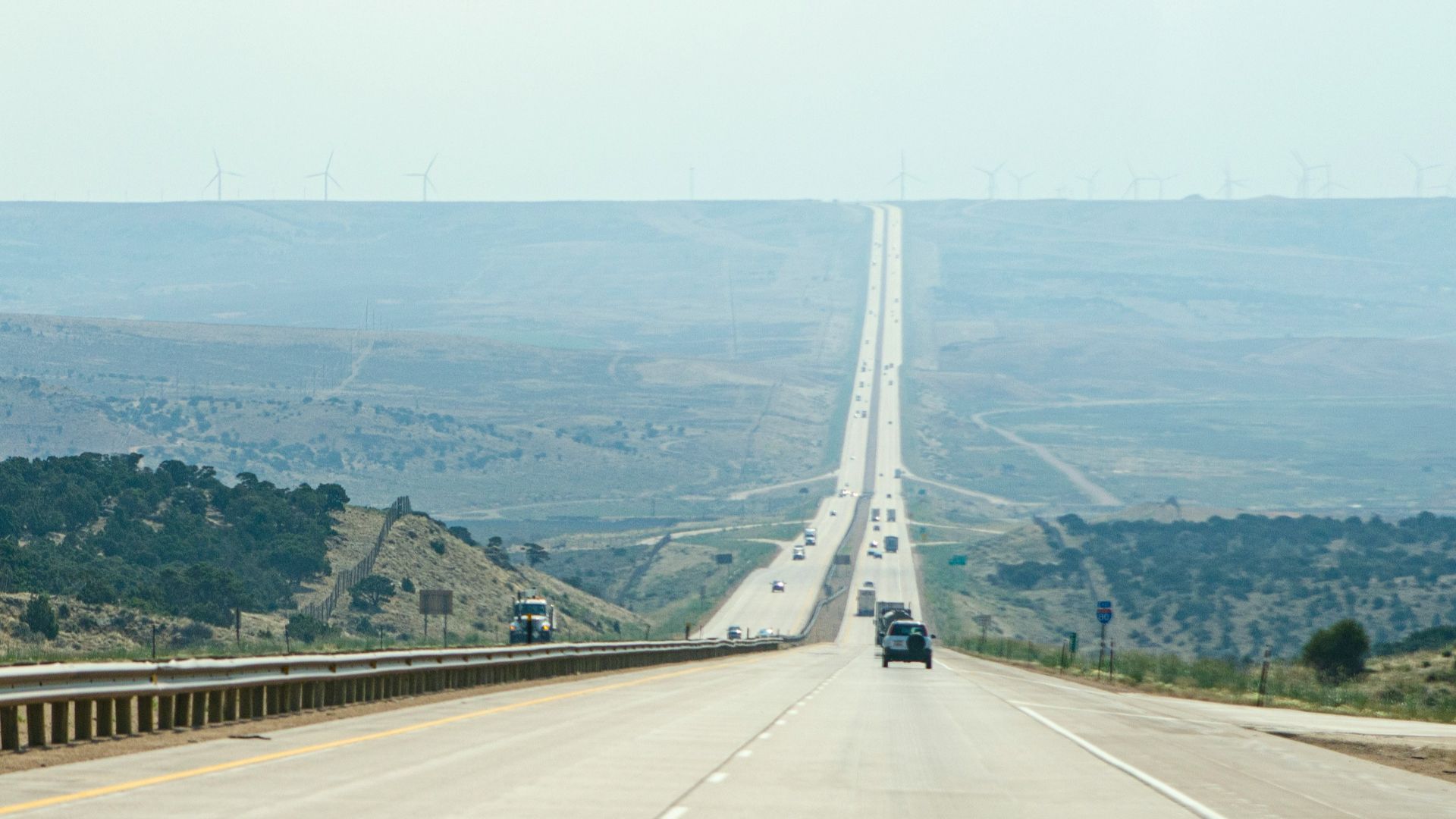 white car on gray concrete road during daytime