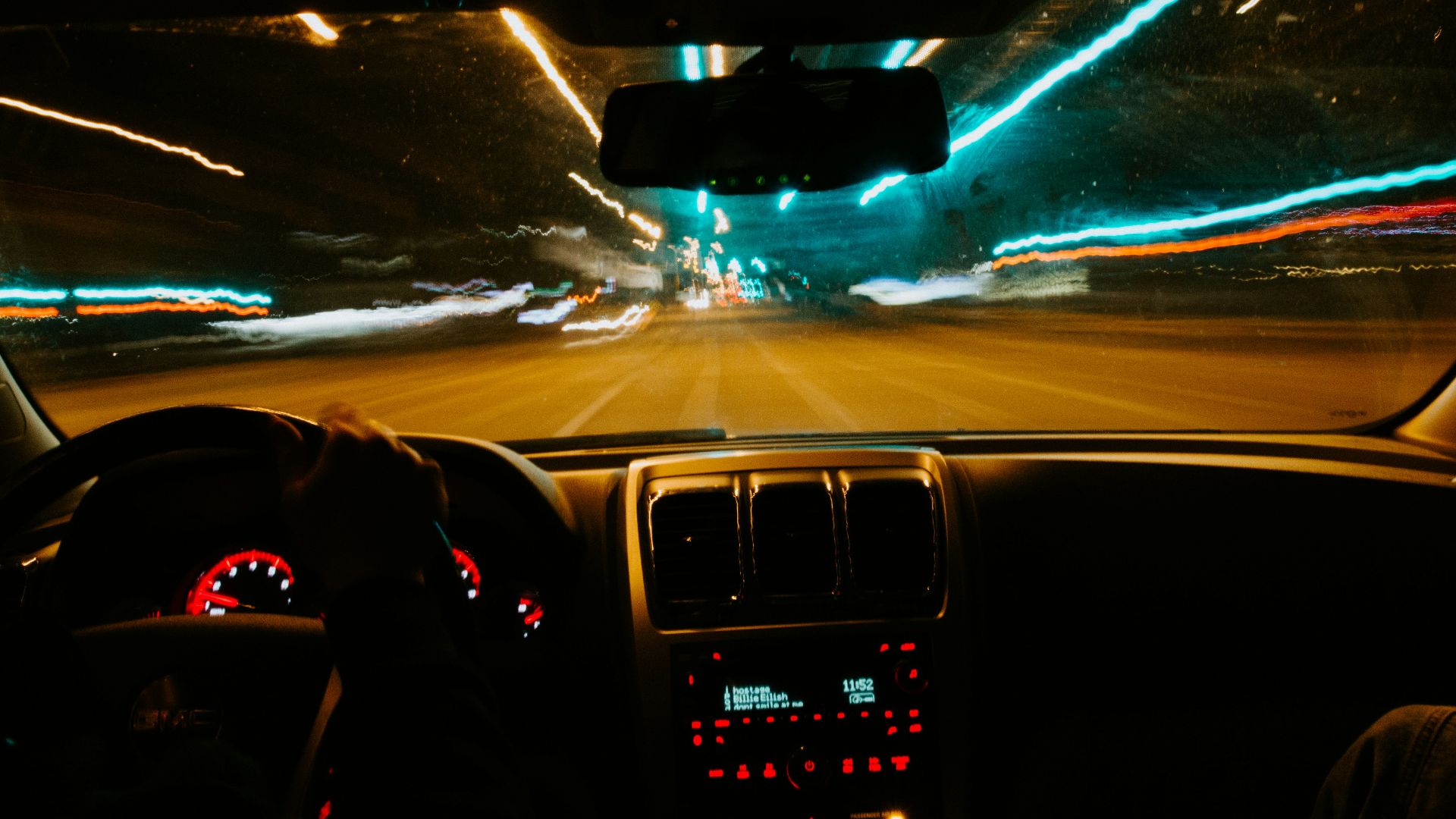 person driving car during night time